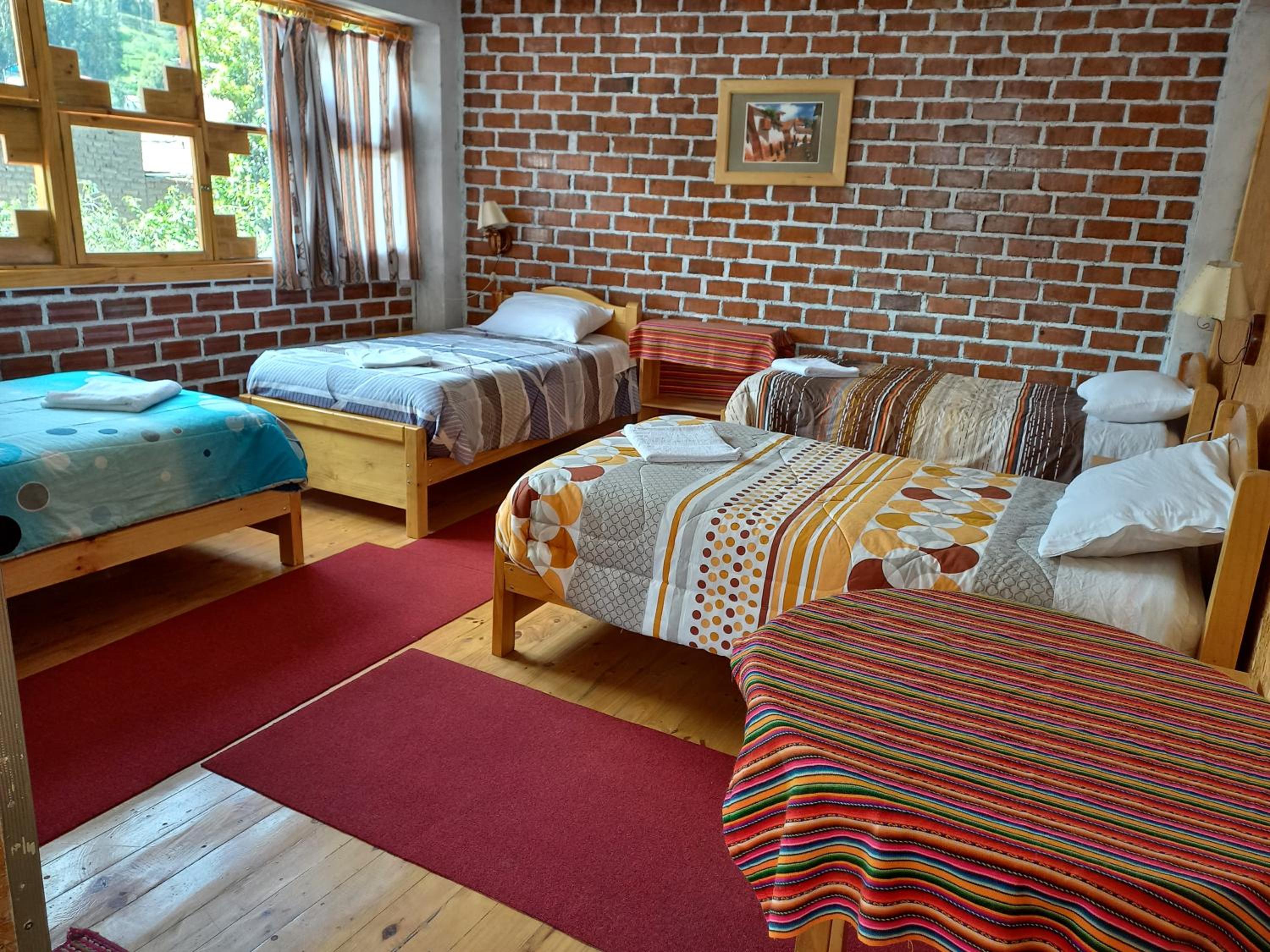 Quadruple Room with Private Bathroom photo 2