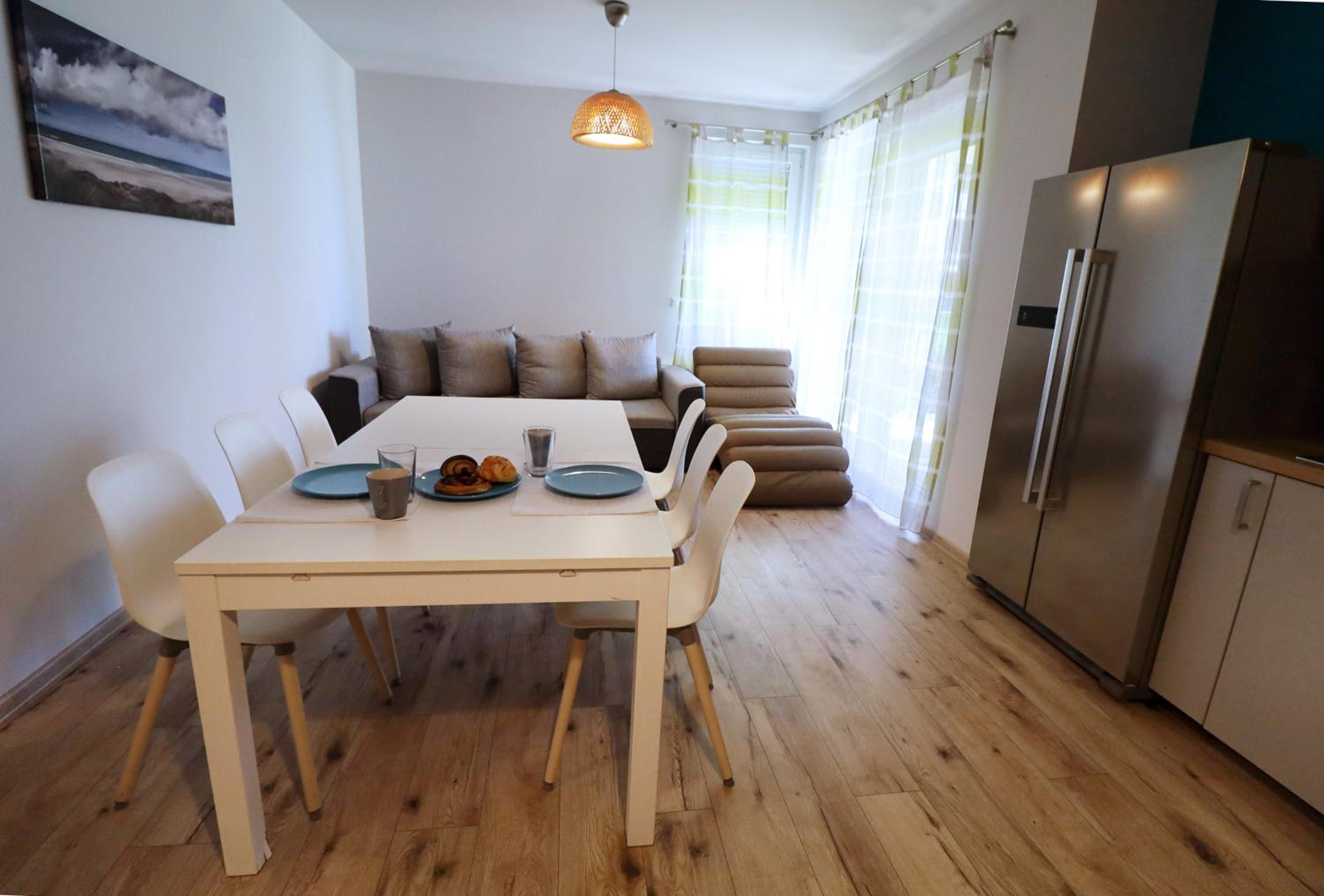 Three-Bedroom Apartment - Photo 6