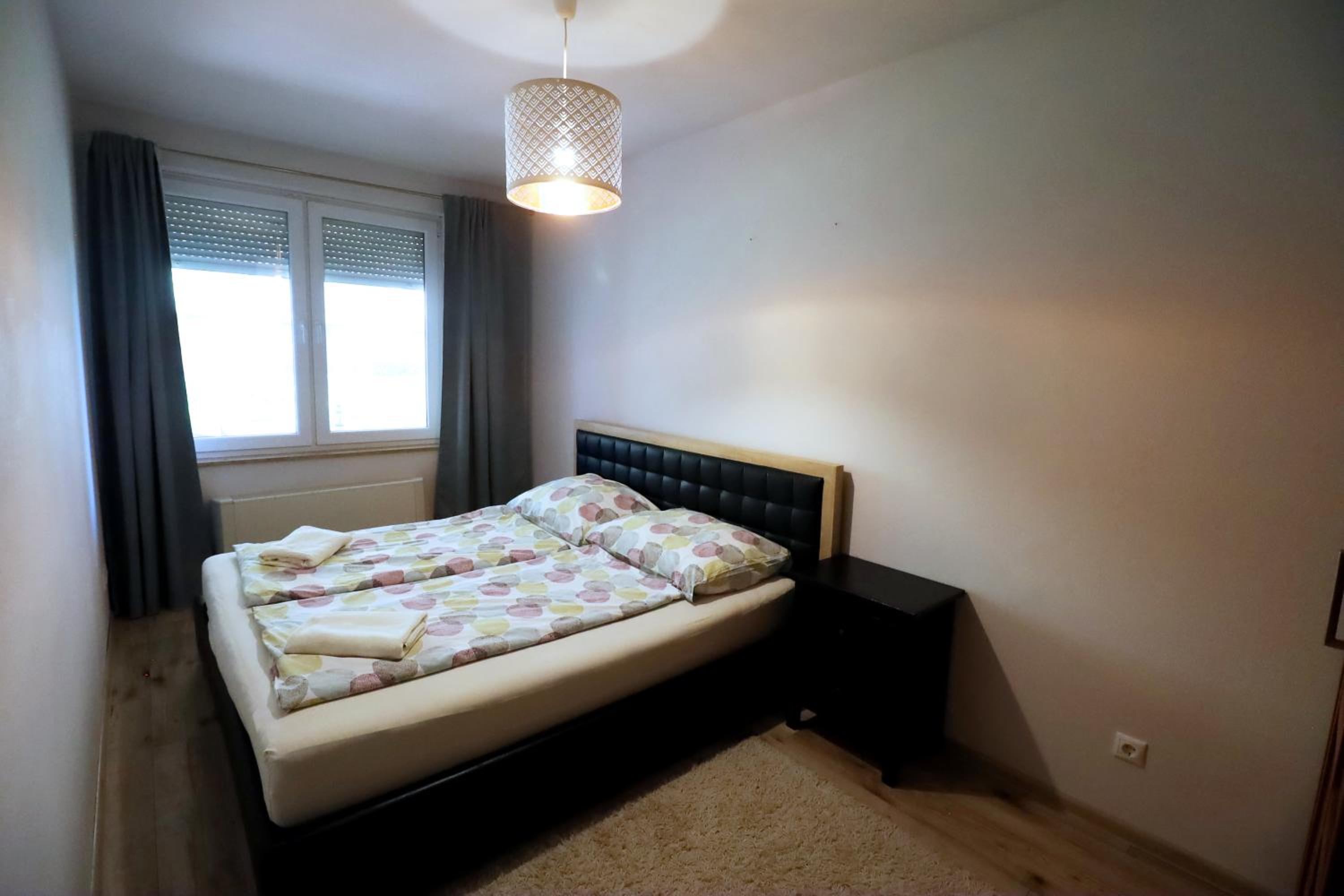 Three-Bedroom Apartment - Photo 14