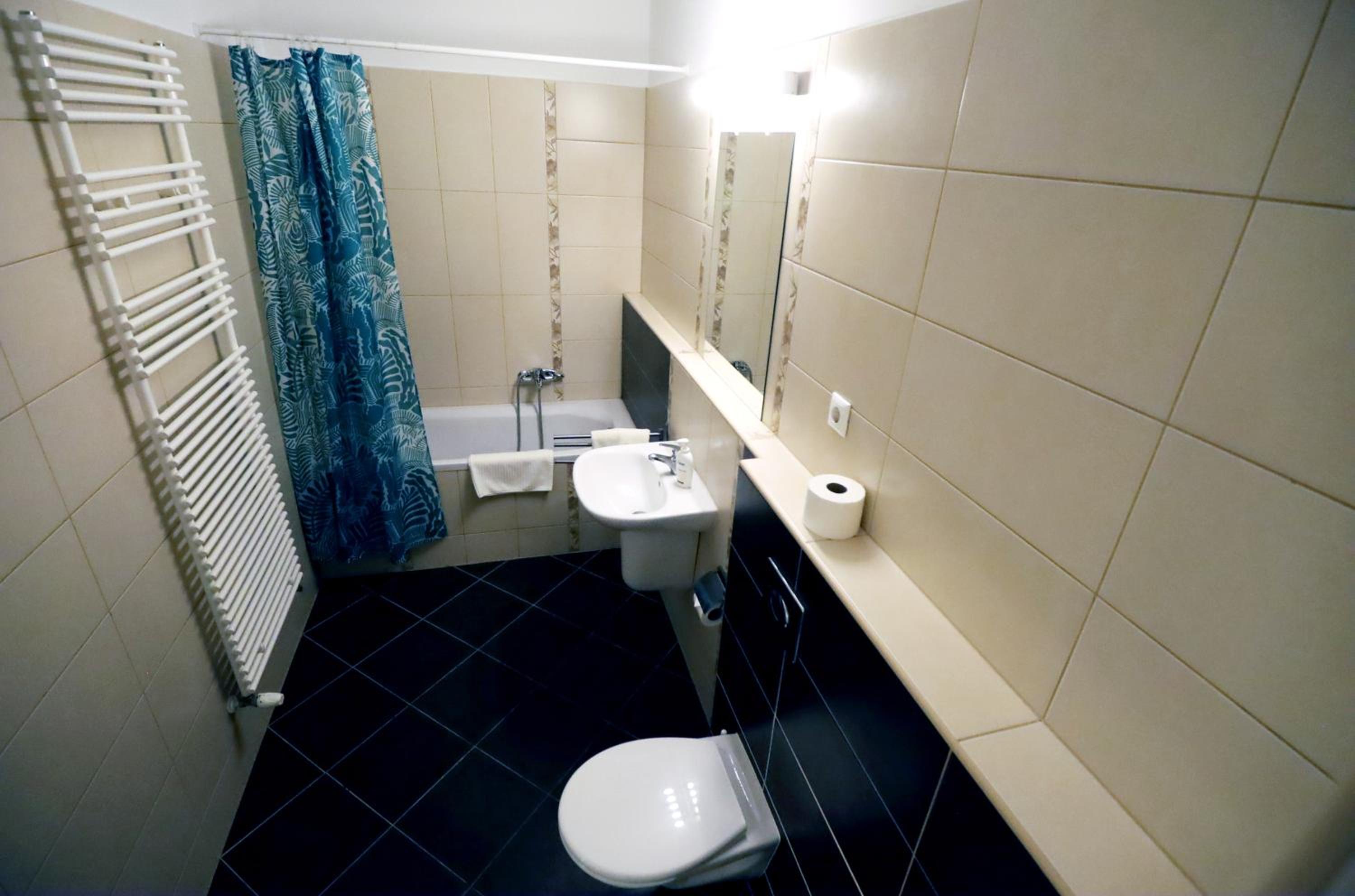 Three-Bedroom Apartment - Photo 3