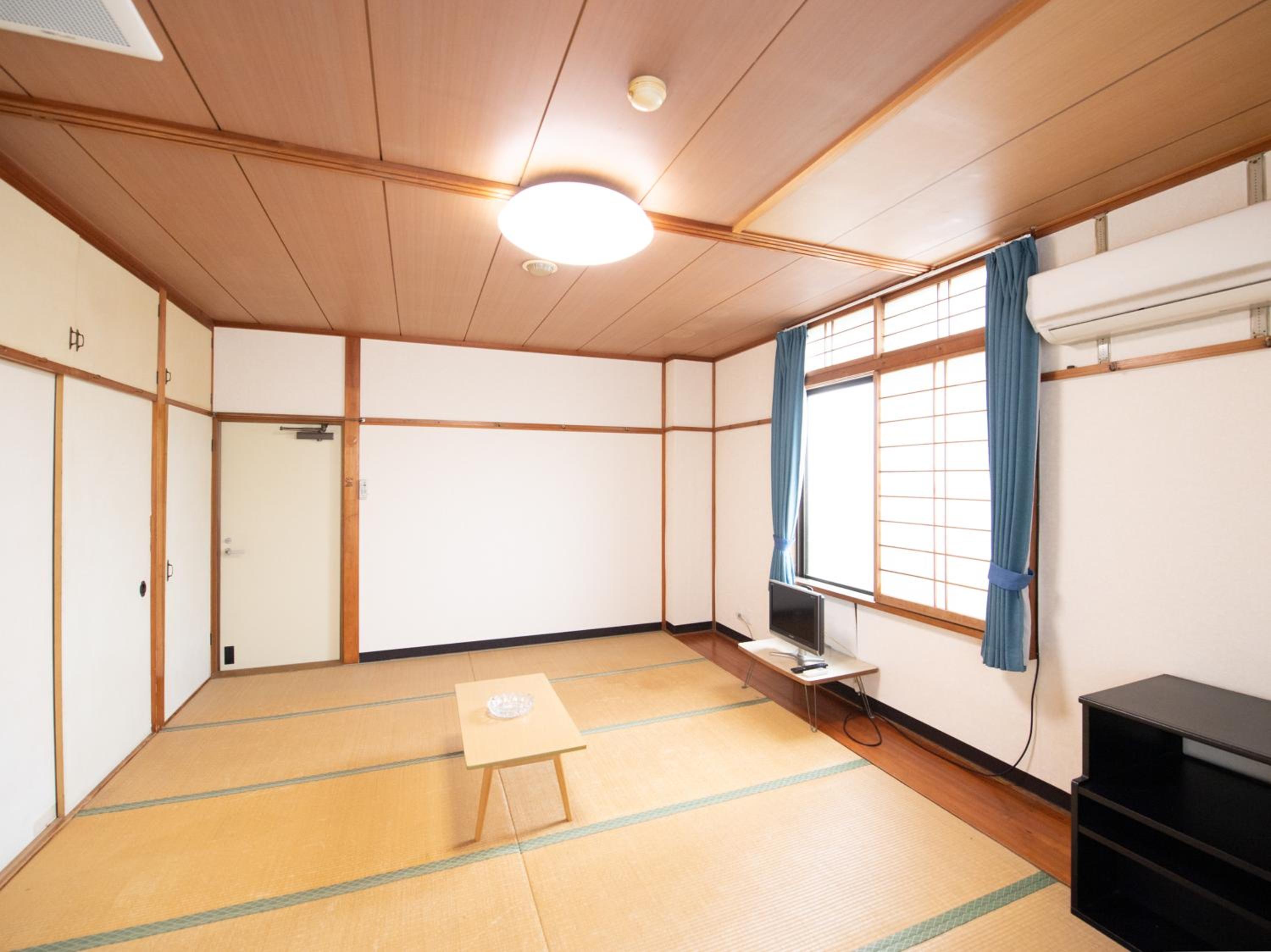 Quadruple Room with Shared Bathroom