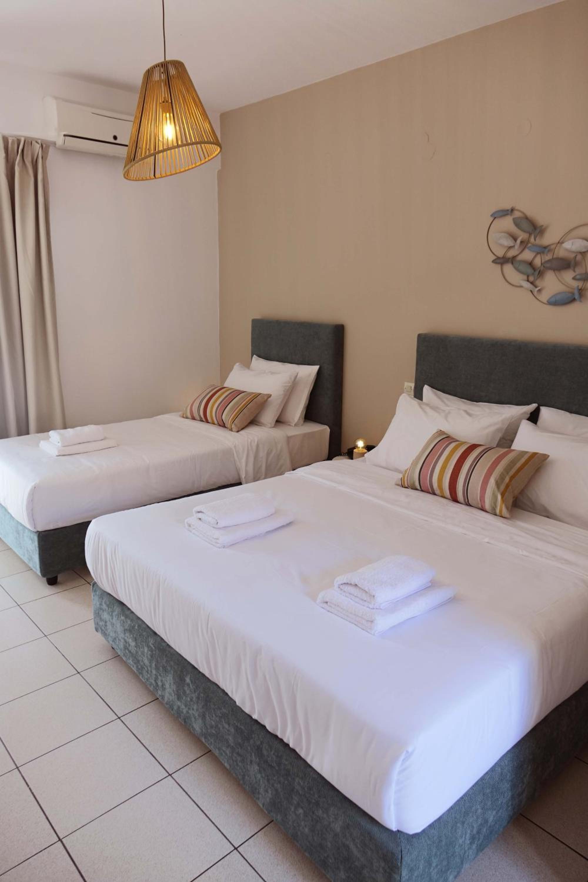 Triple Room with Balcony - Photo 1