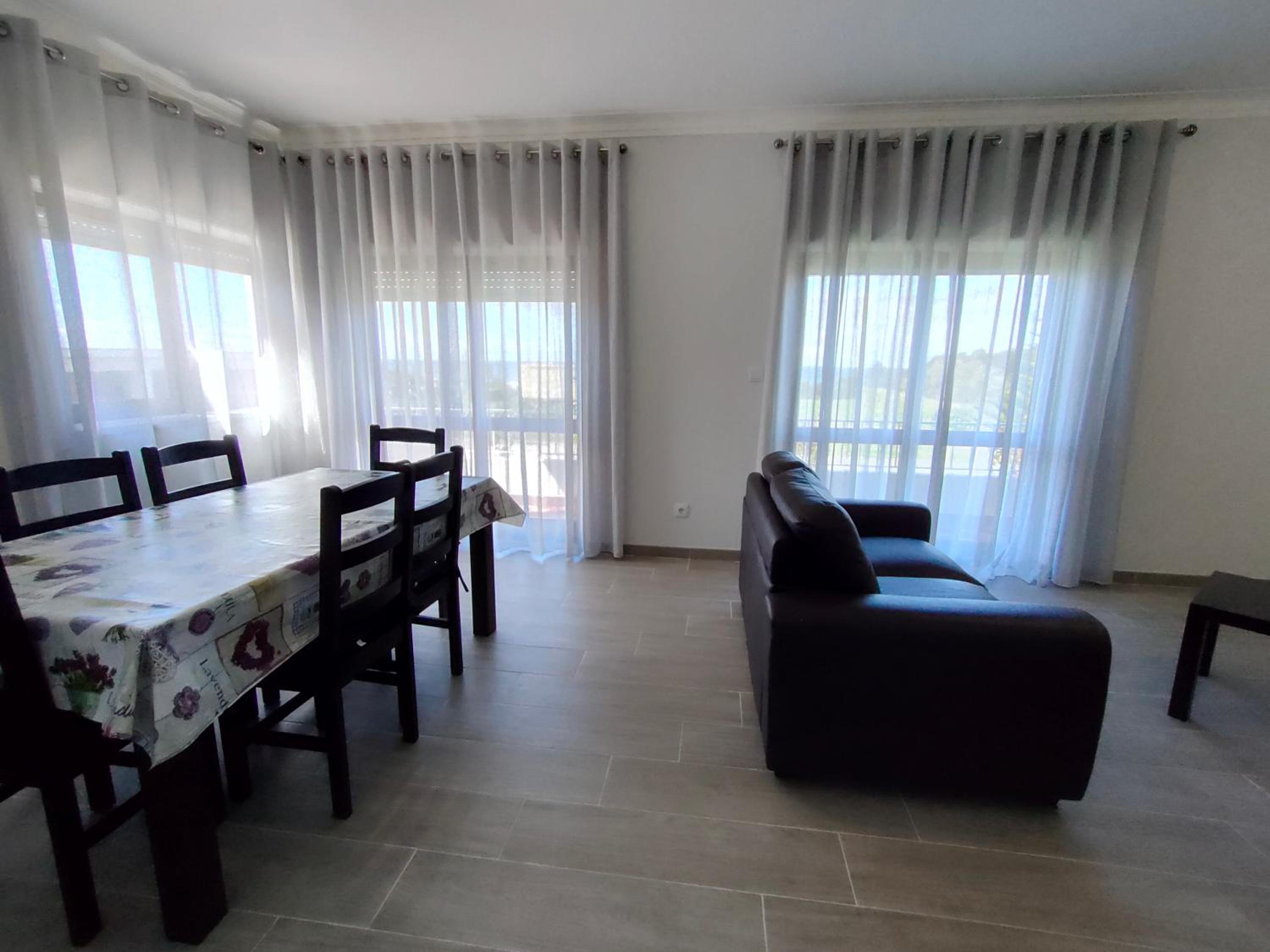 Three-Bedroom Apartment with Balcony - Photo 7