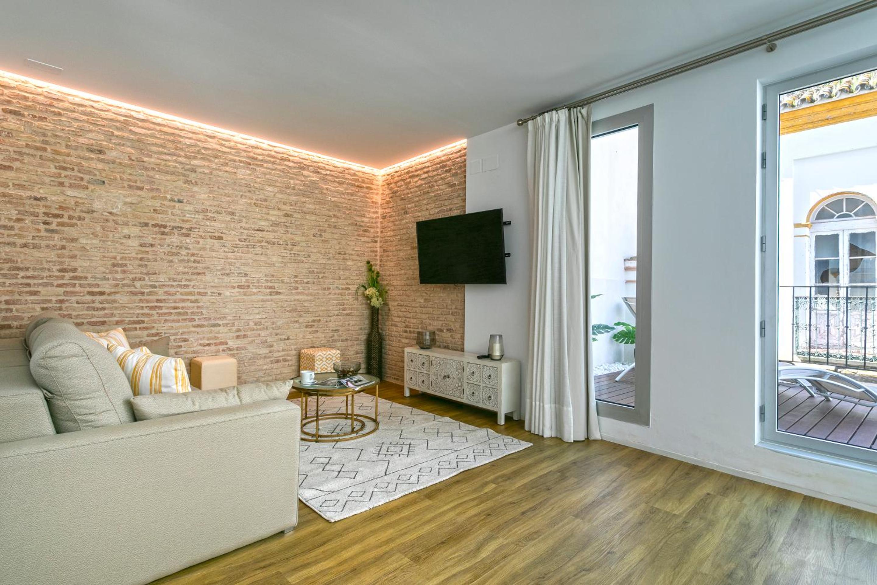 Apartamento de tres habitaciones con terraza.