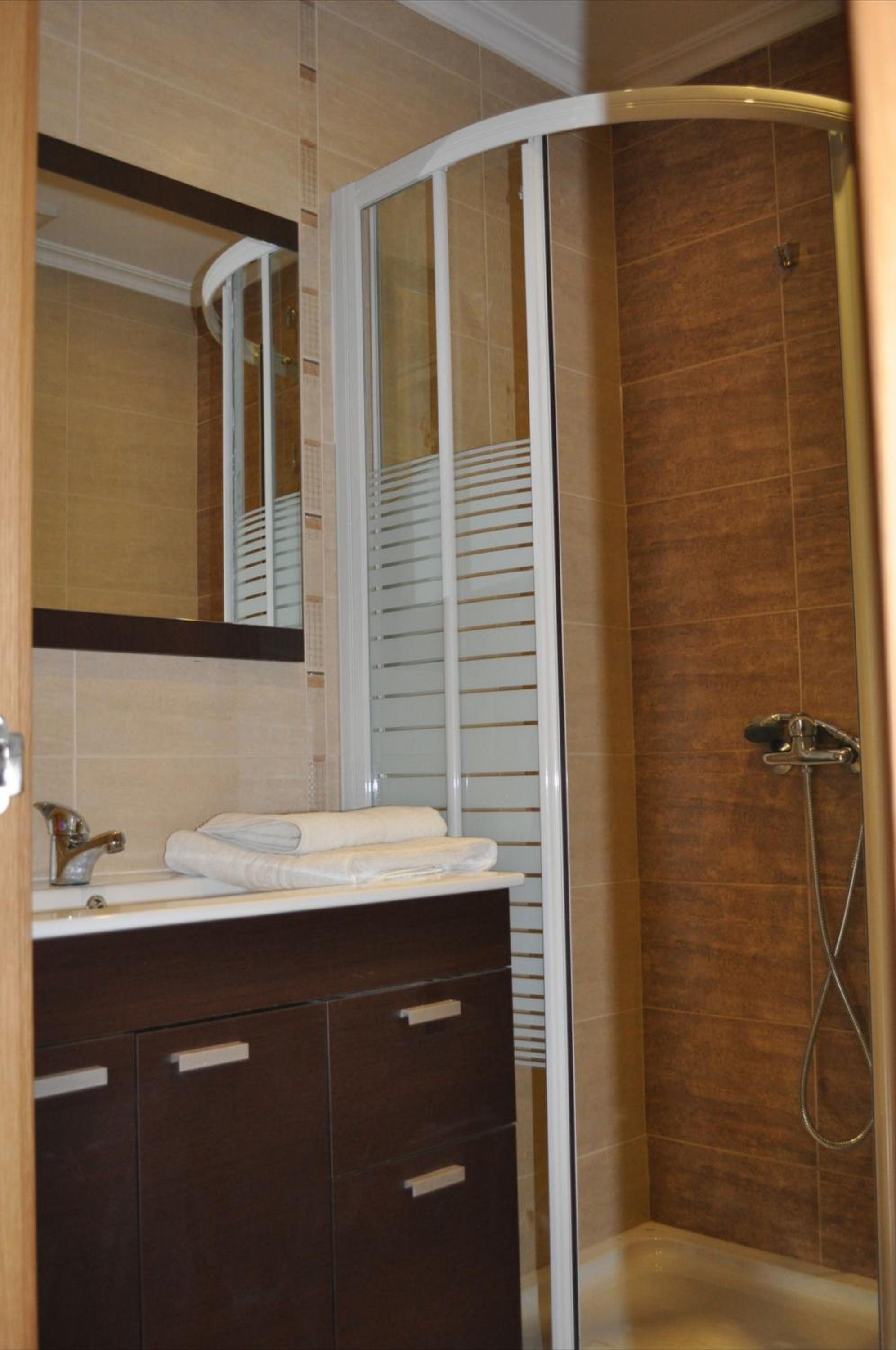 Three-Bedroom Apartment - Photo 23