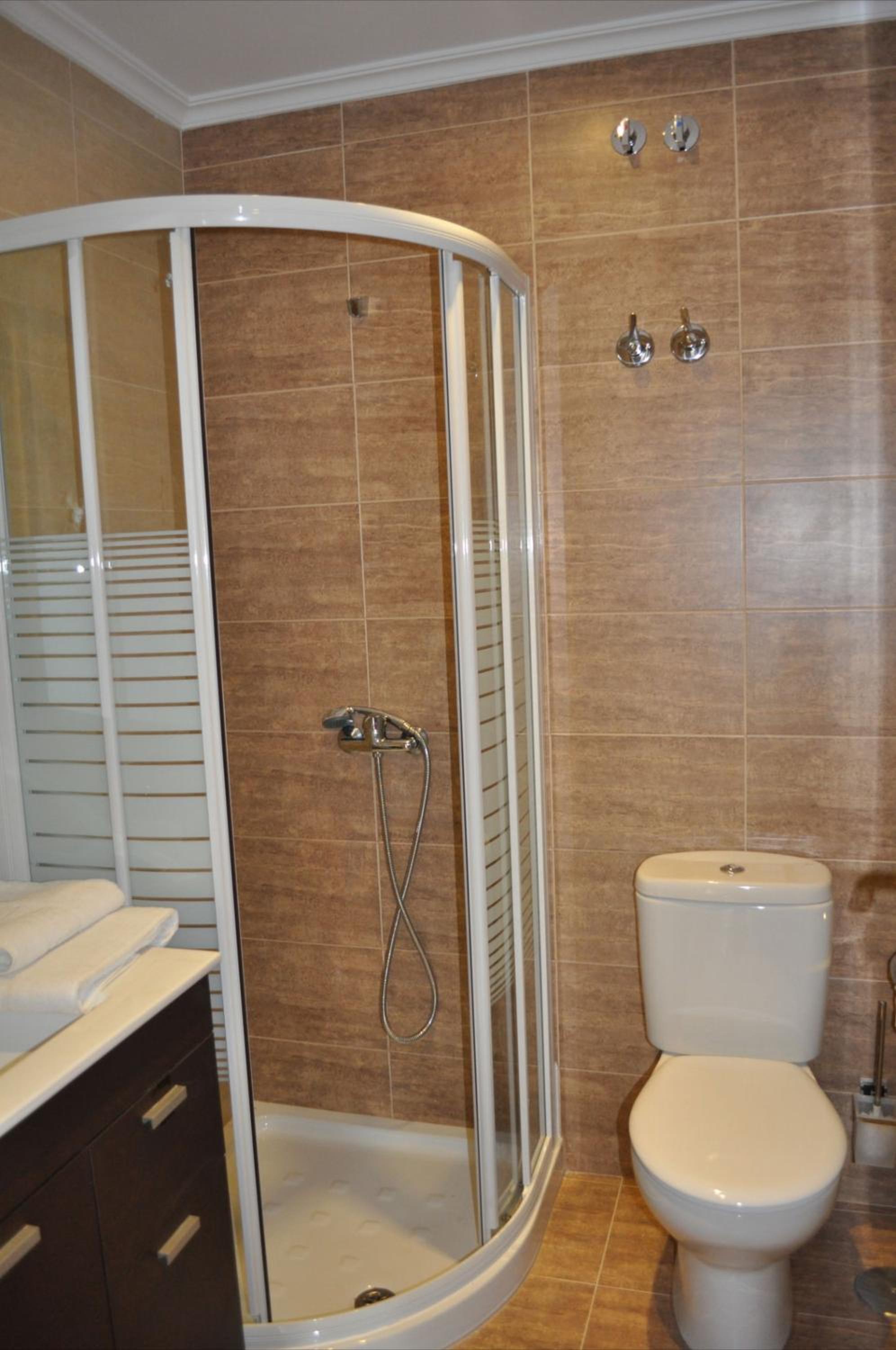 Three-Bedroom Apartment - Photo 22