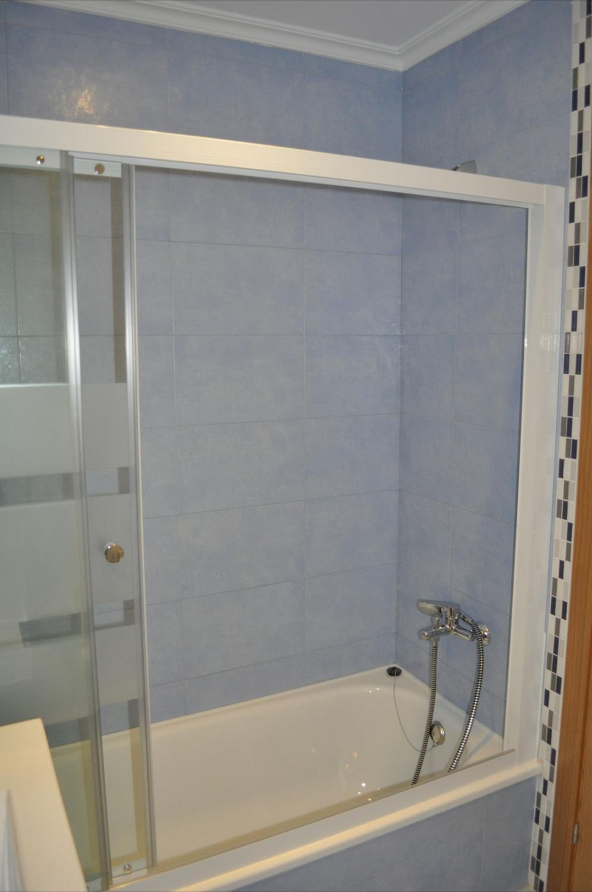 Three-Bedroom Apartment - Photo 19