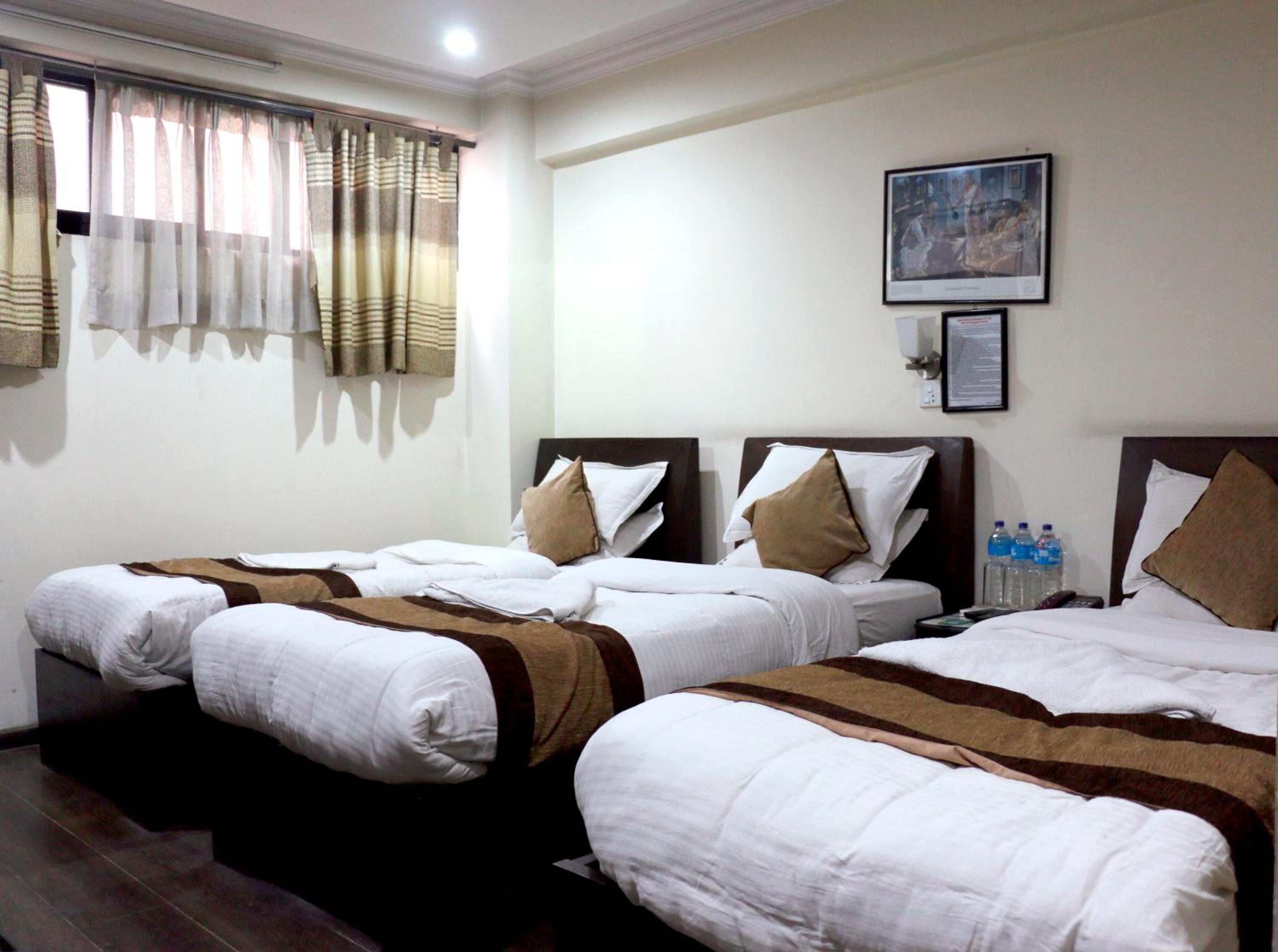 Deluxe Triple Room