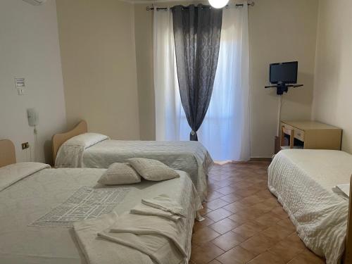Standard Quadruple Room - Photo 2