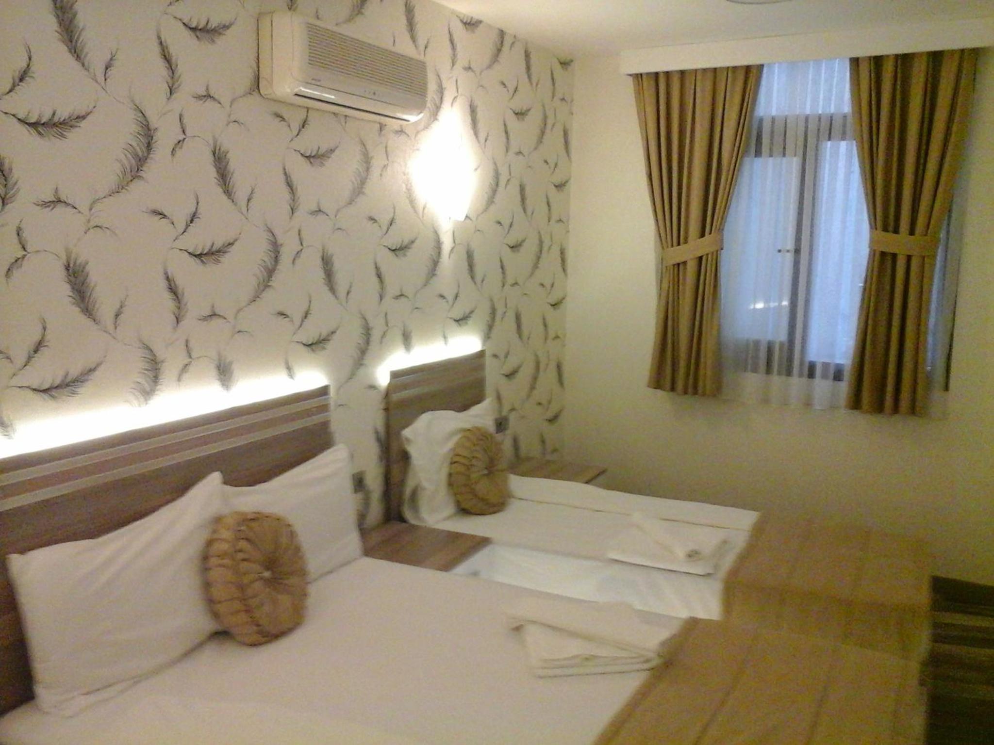 Standard Quadruple Room - Photo 4