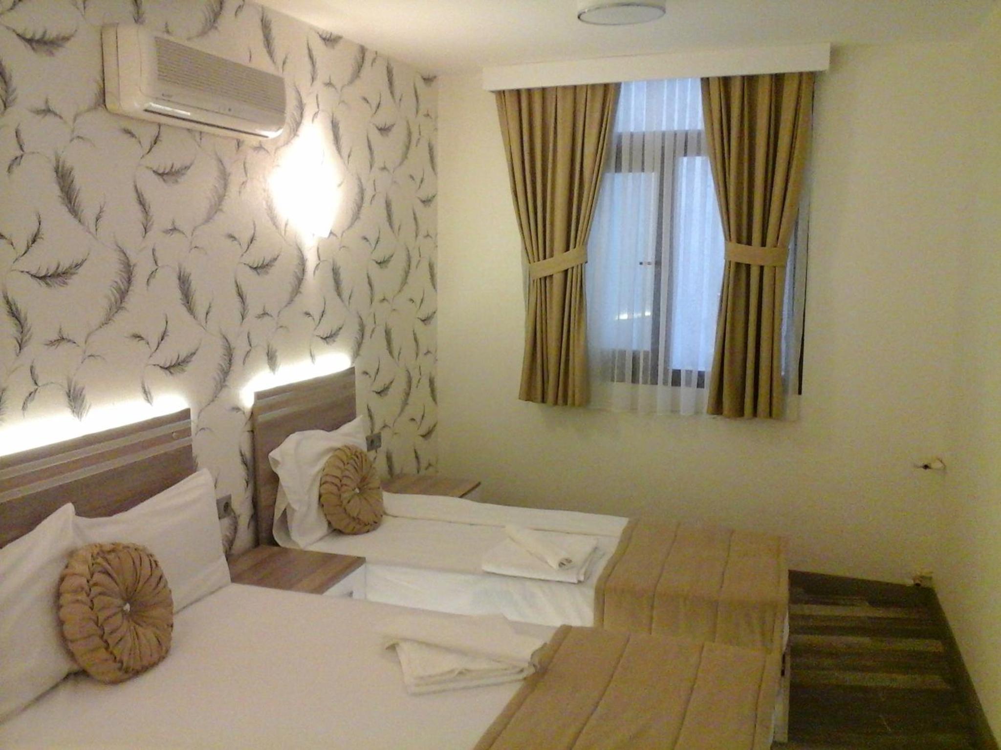 Standard Quadruple Room - Photo 3
