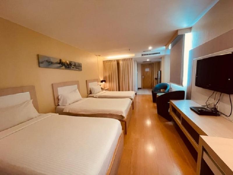 Deluxe Triple Room - Photo 2