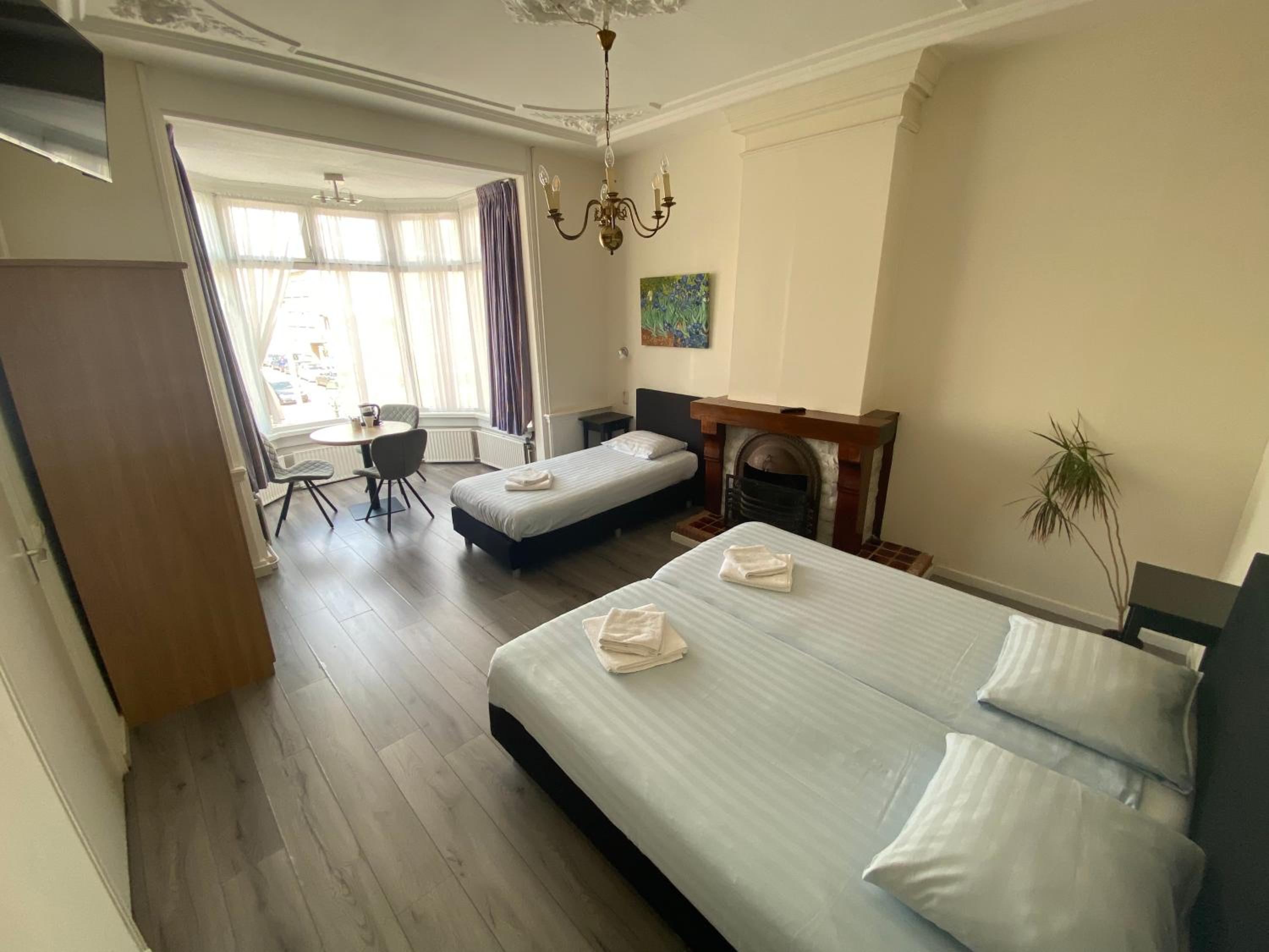 Deluxe Triple Room - Photo 1
