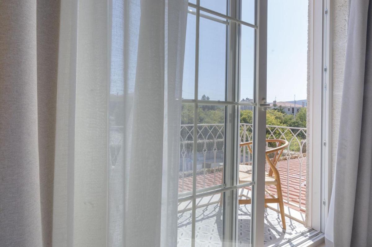 Deluxe Double Room with Balcony - Photo 2