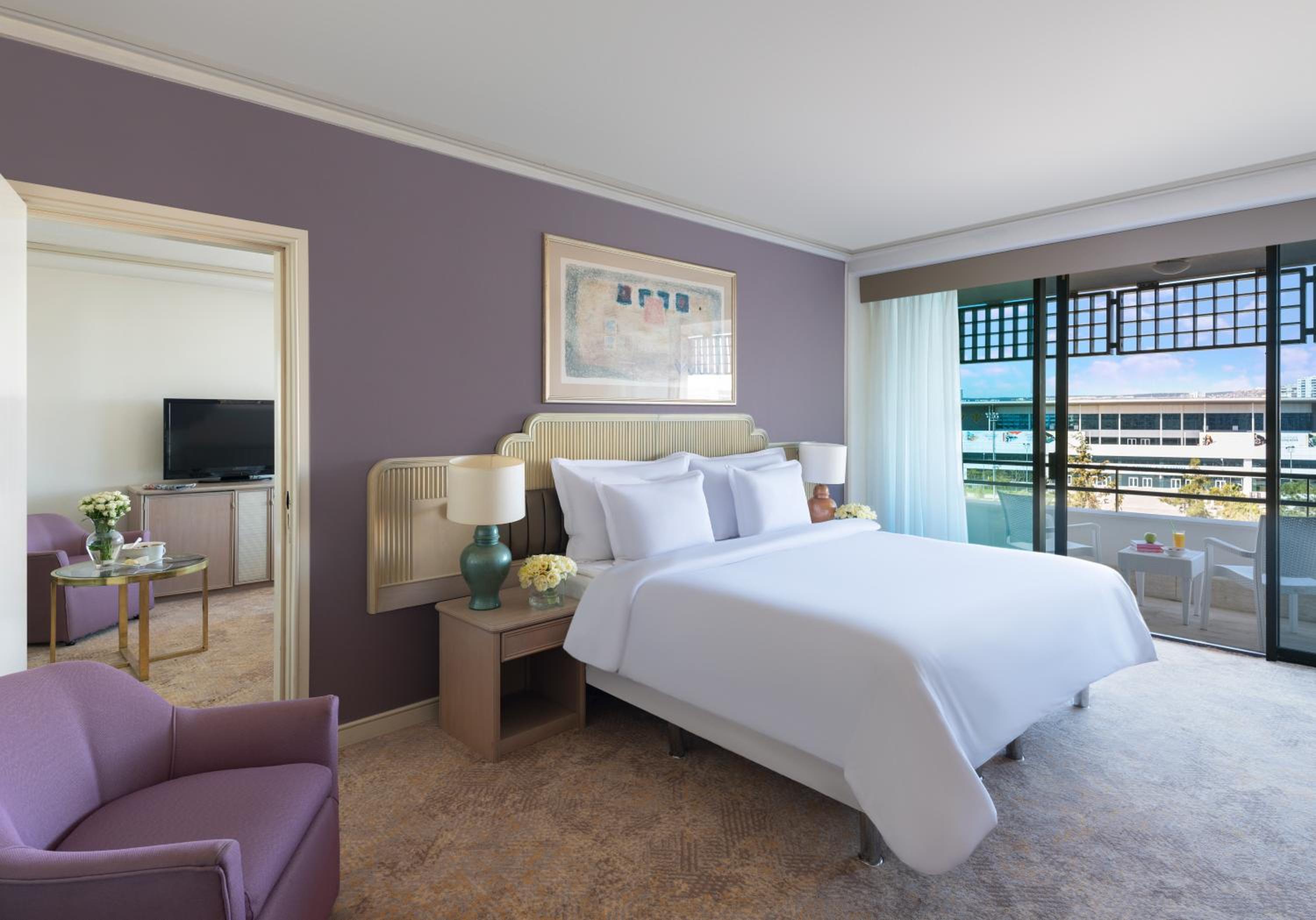 Family King Bed Suite with Two Twin Beds, Terrace and City View photo 1