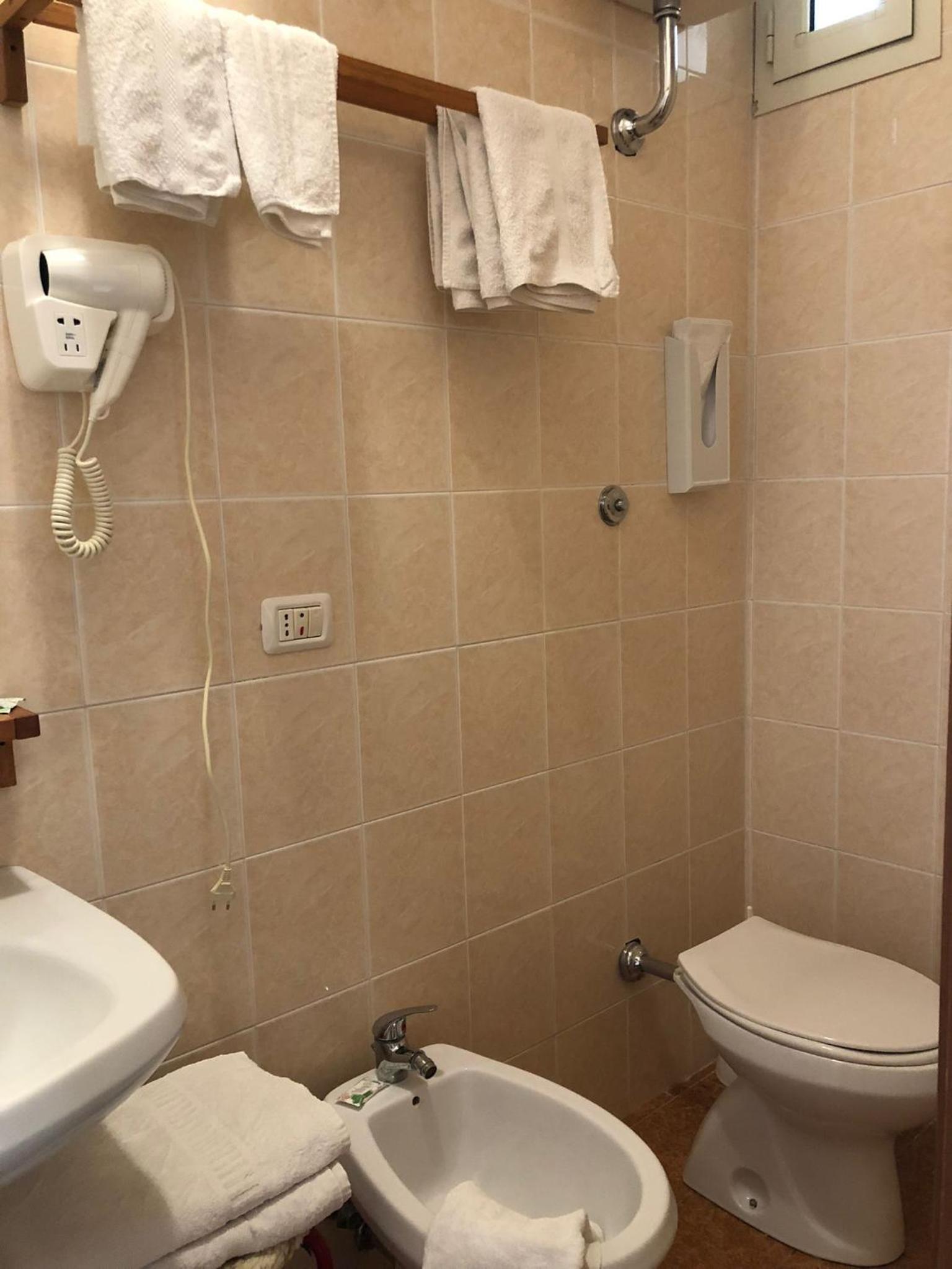Quadruple Room with Balcony photo 3