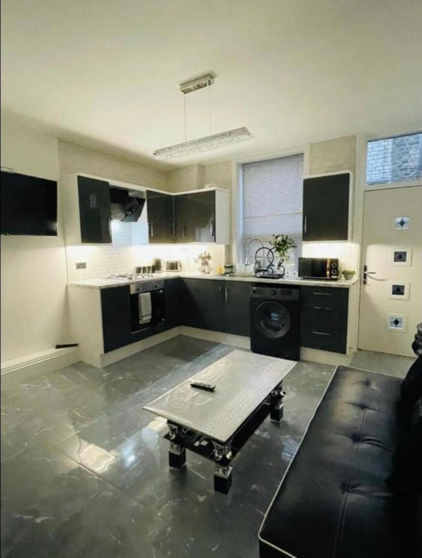 Three-Bedroom Apartment - Photo 2