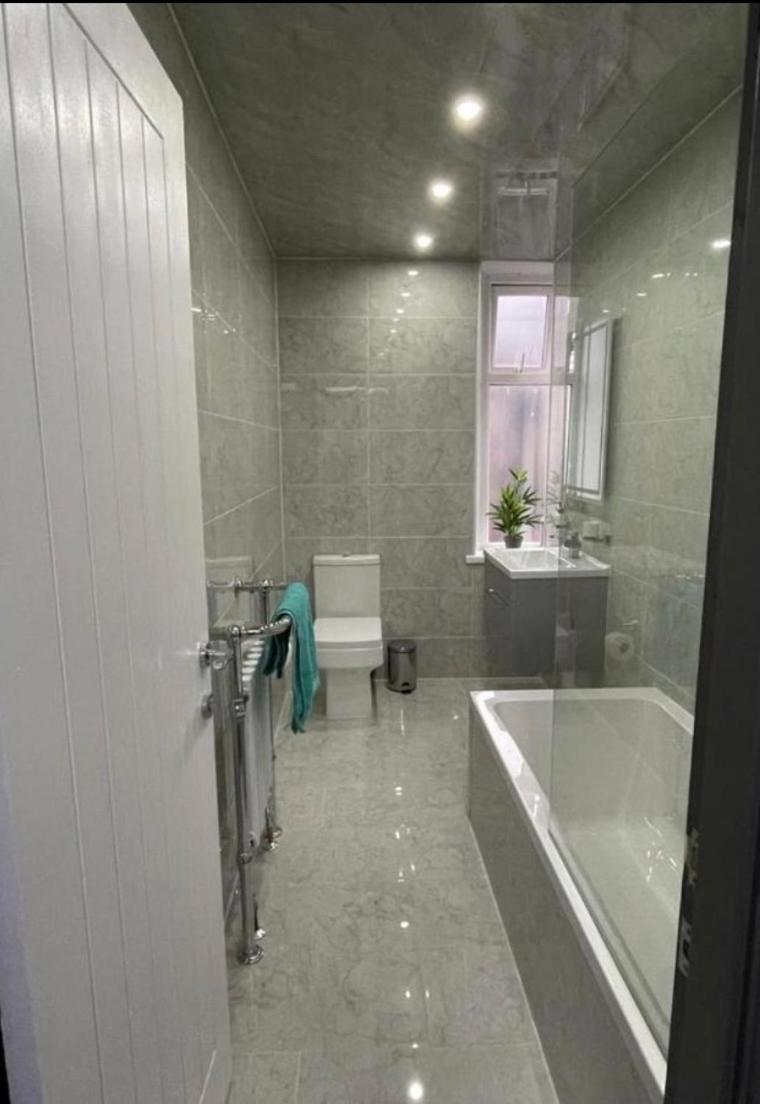 Three-Bedroom Apartment - Photo 9