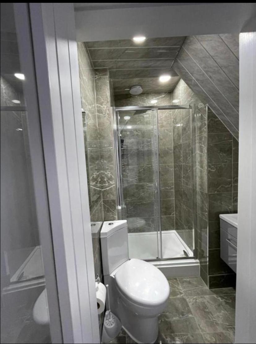 Three-Bedroom Apartment - Photo 11