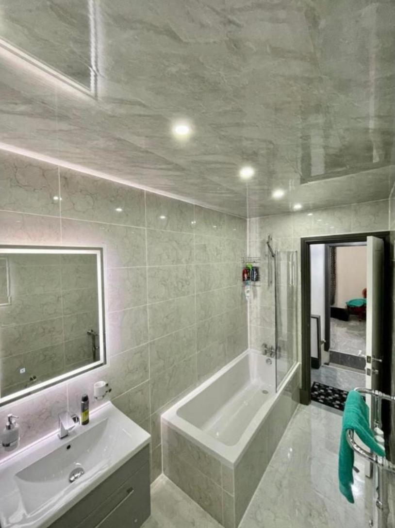Three-Bedroom Apartment - Photo 13