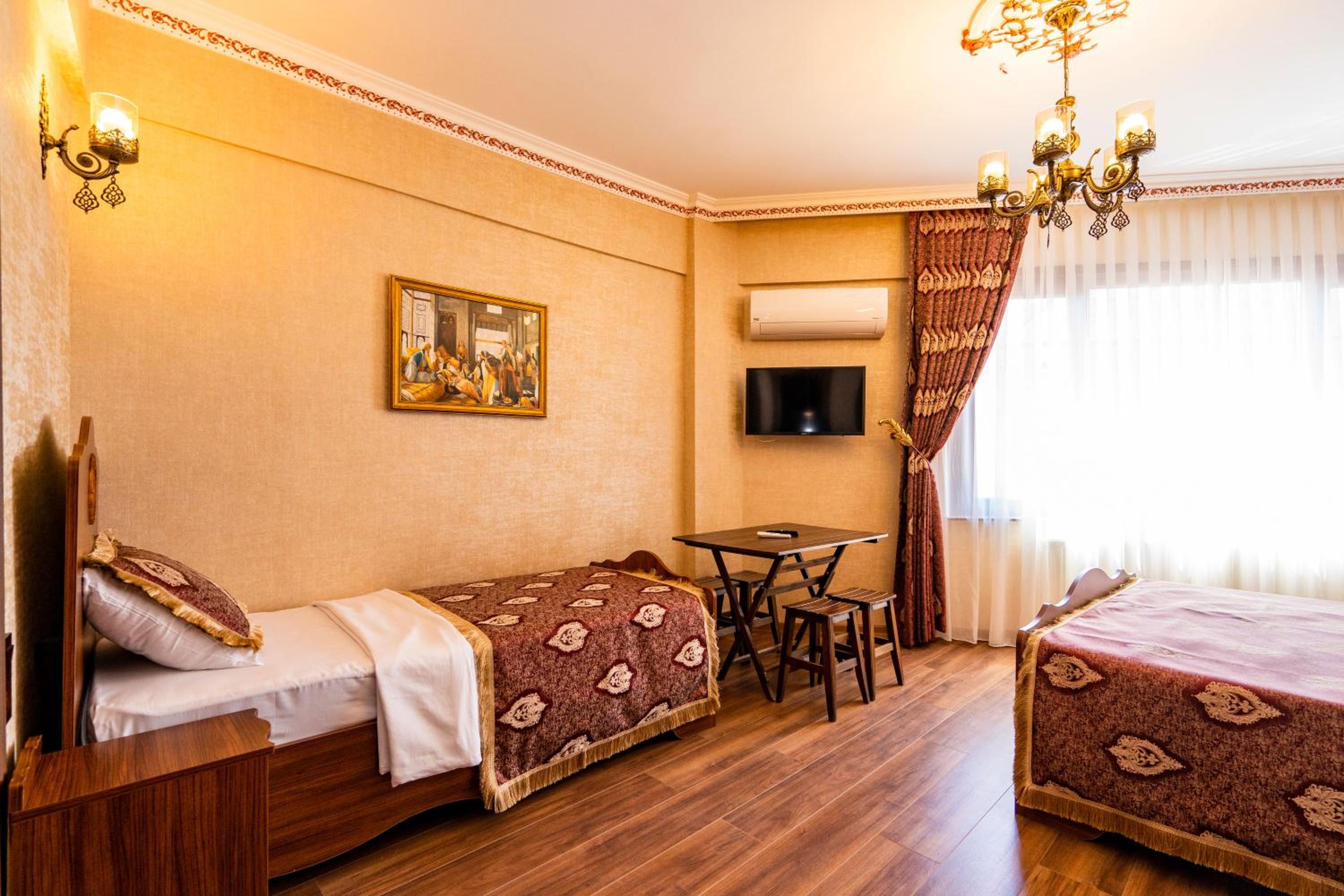 Economy Triple Room photo 1