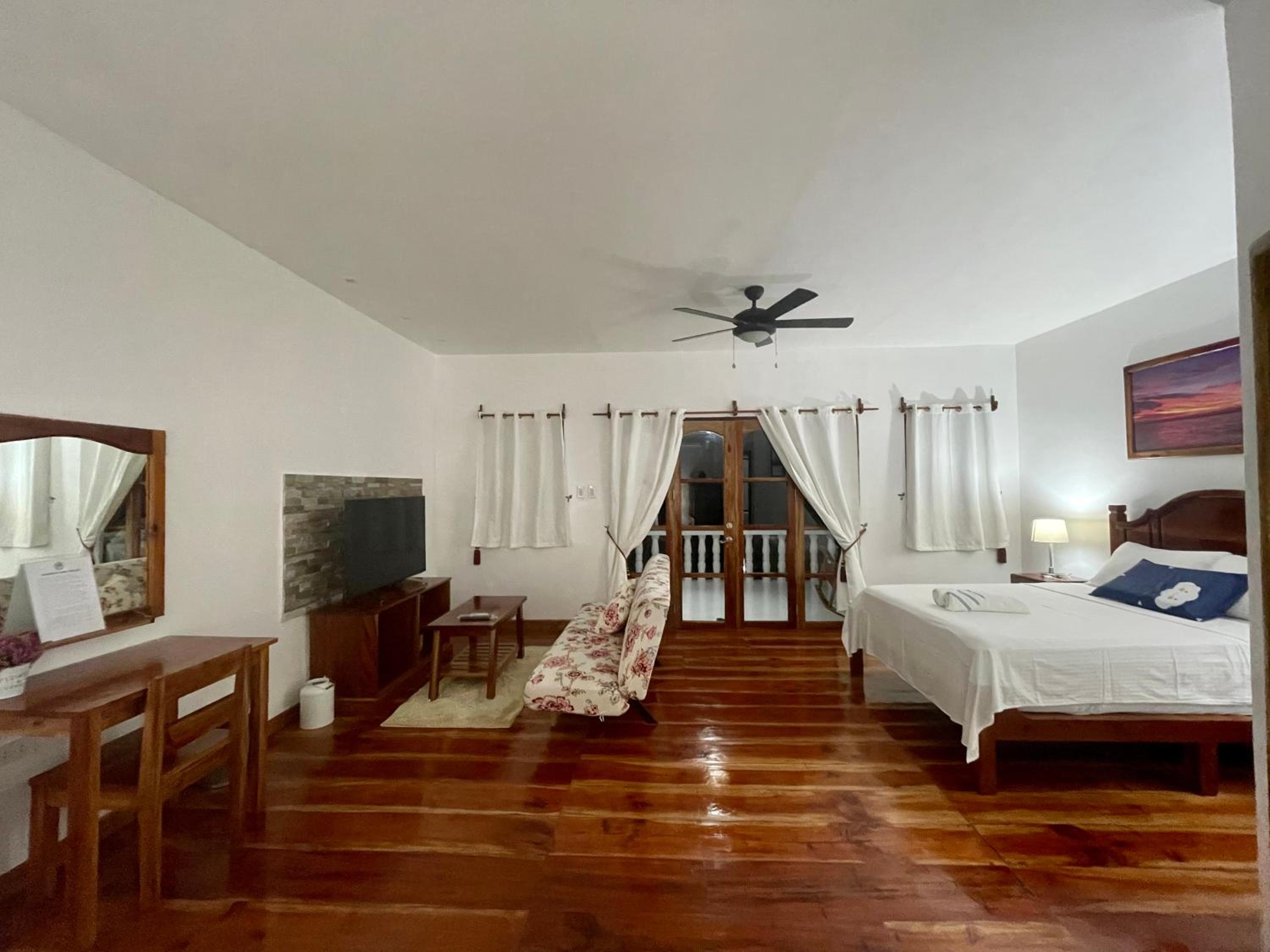Family Room with Balcony - Photo 8