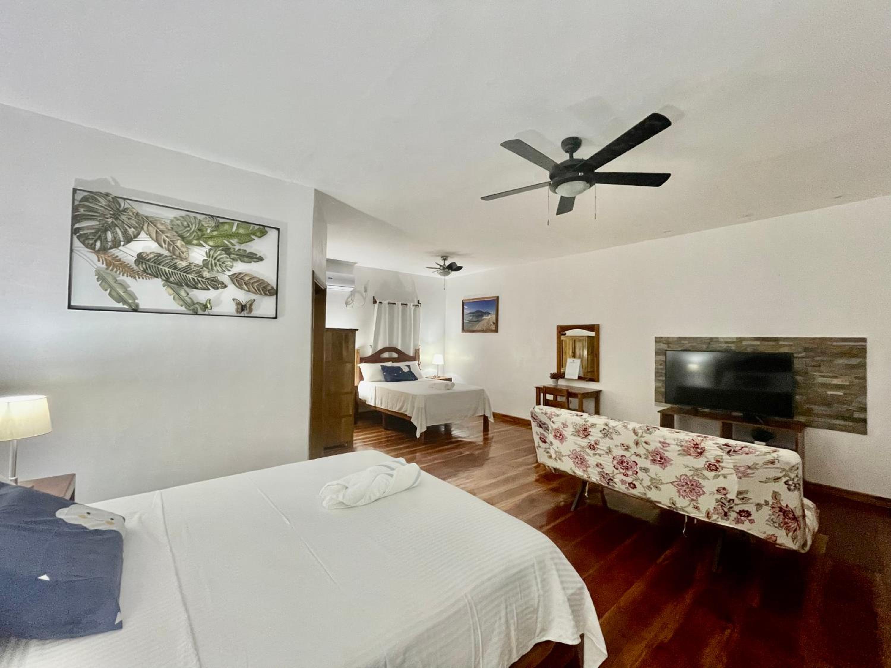 Family Room with Balcony - Photo 9