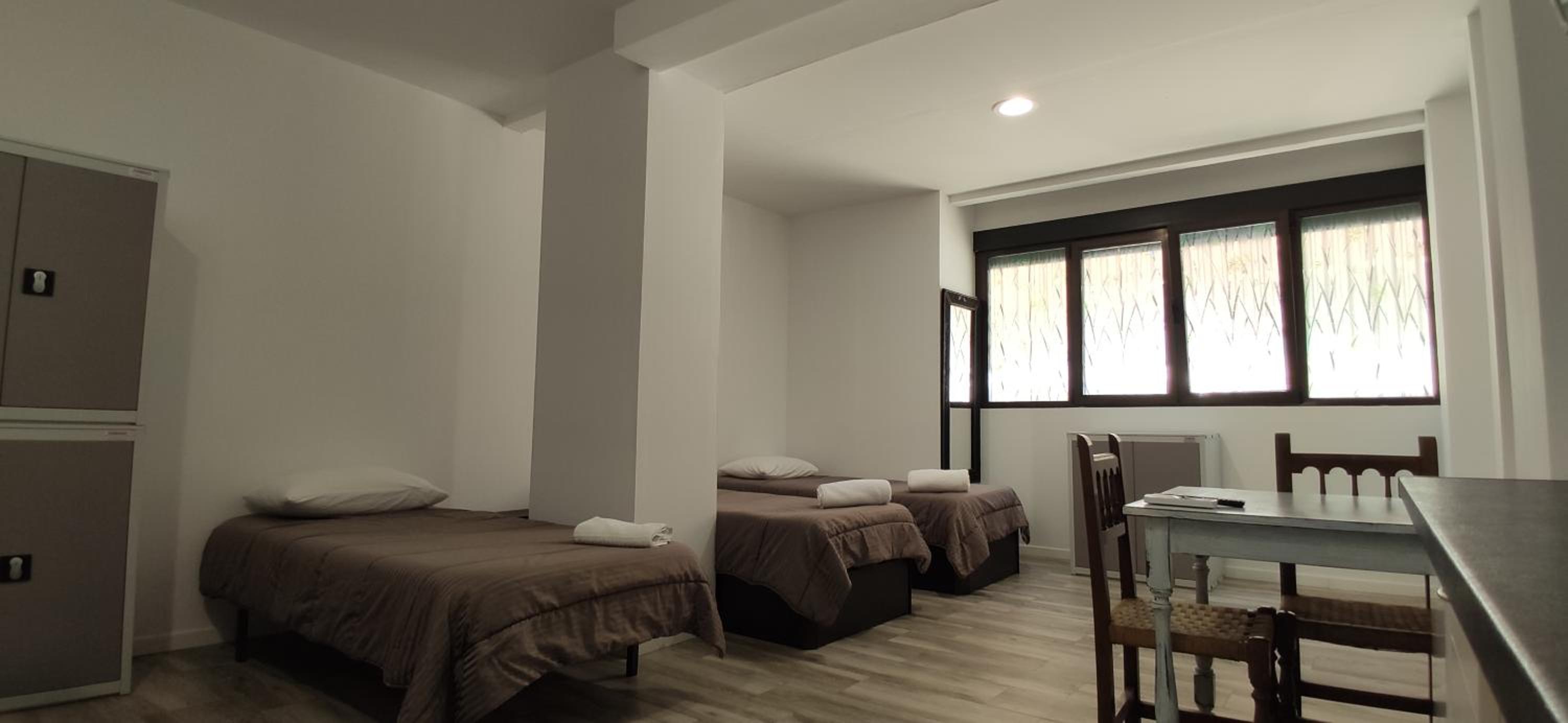 Habitación Triple con Baño Privado