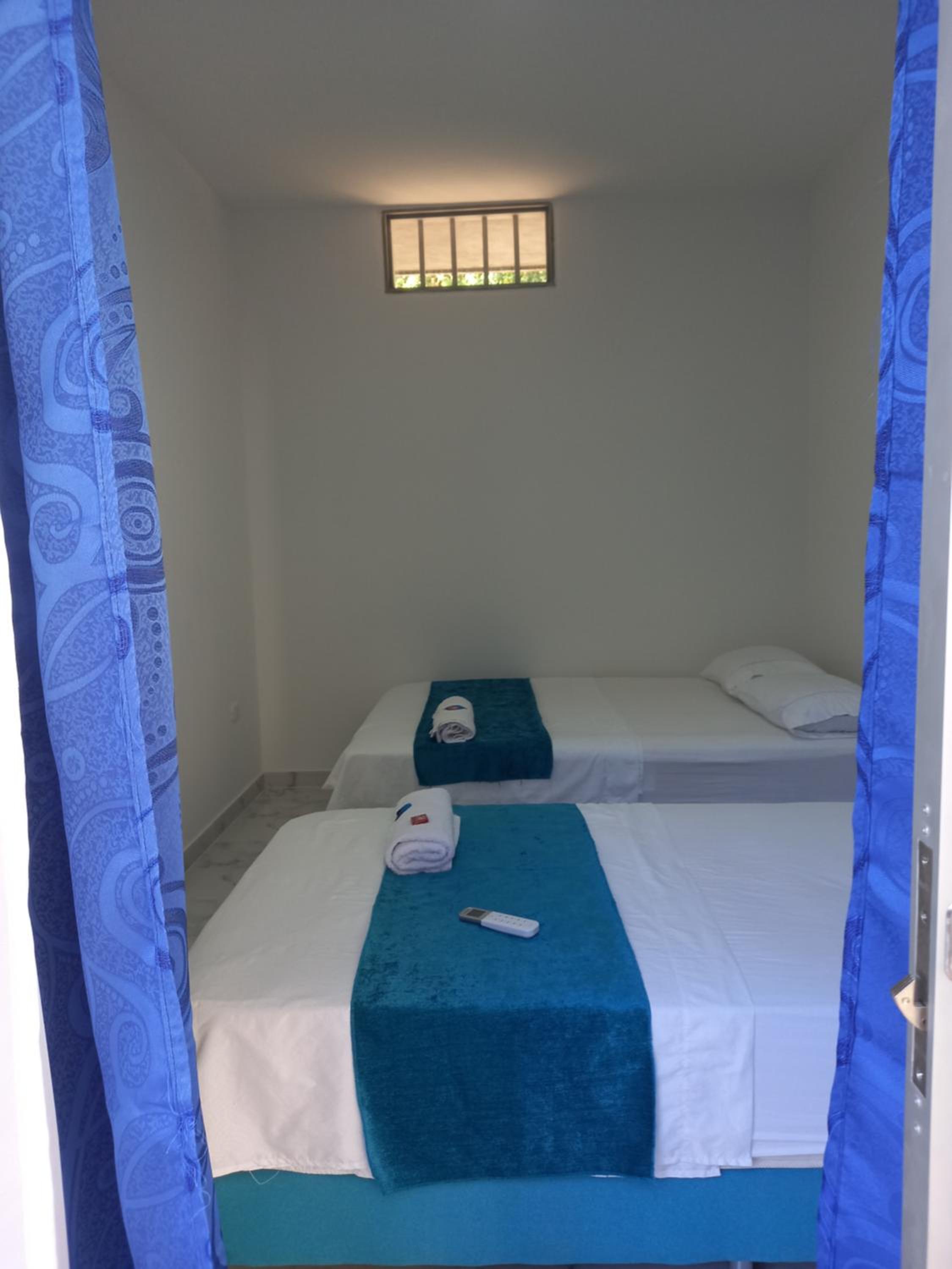Quadruple Room with Private Bathroom photo 1
