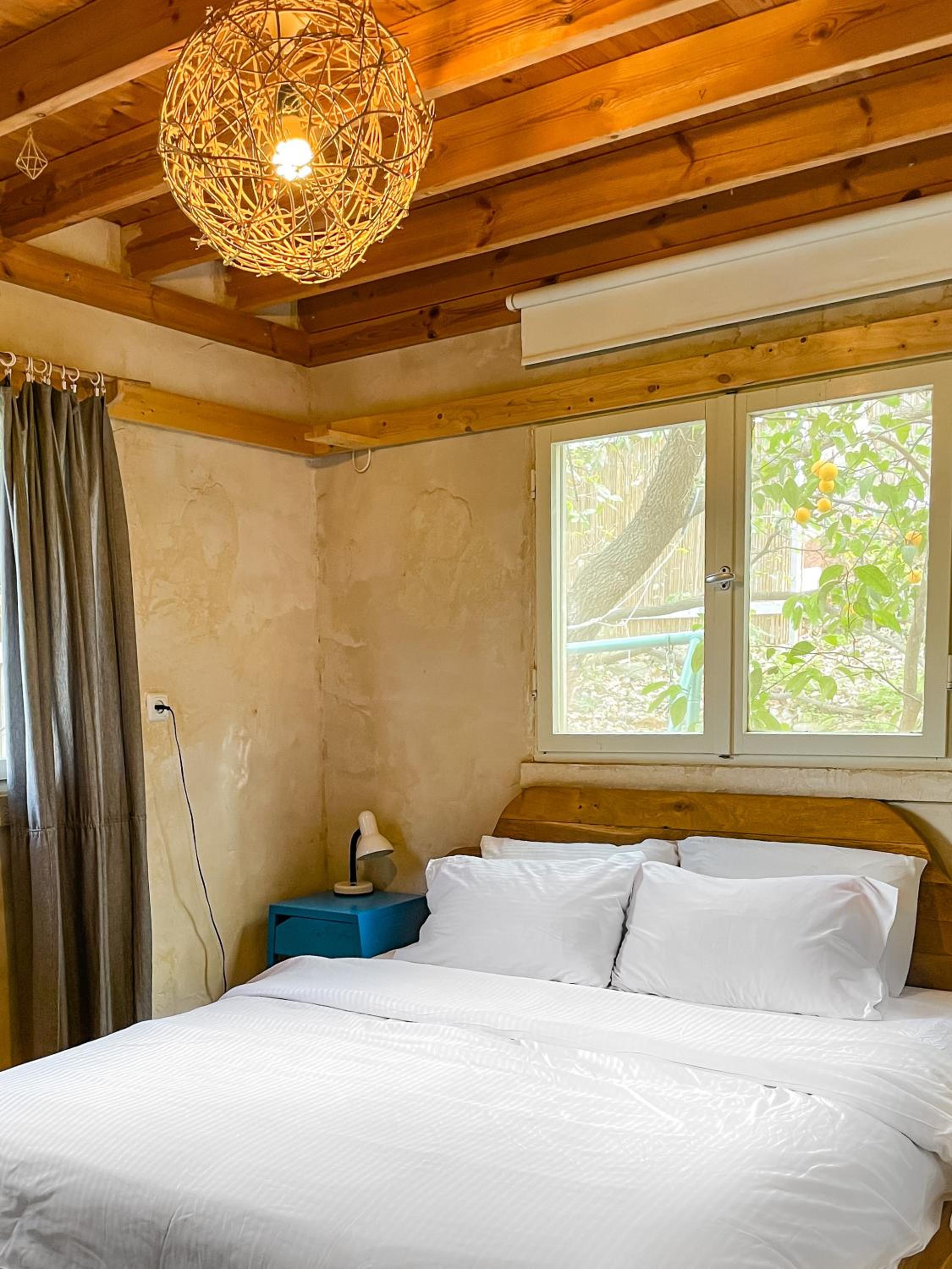 Three-Bedroom House - Photo 27