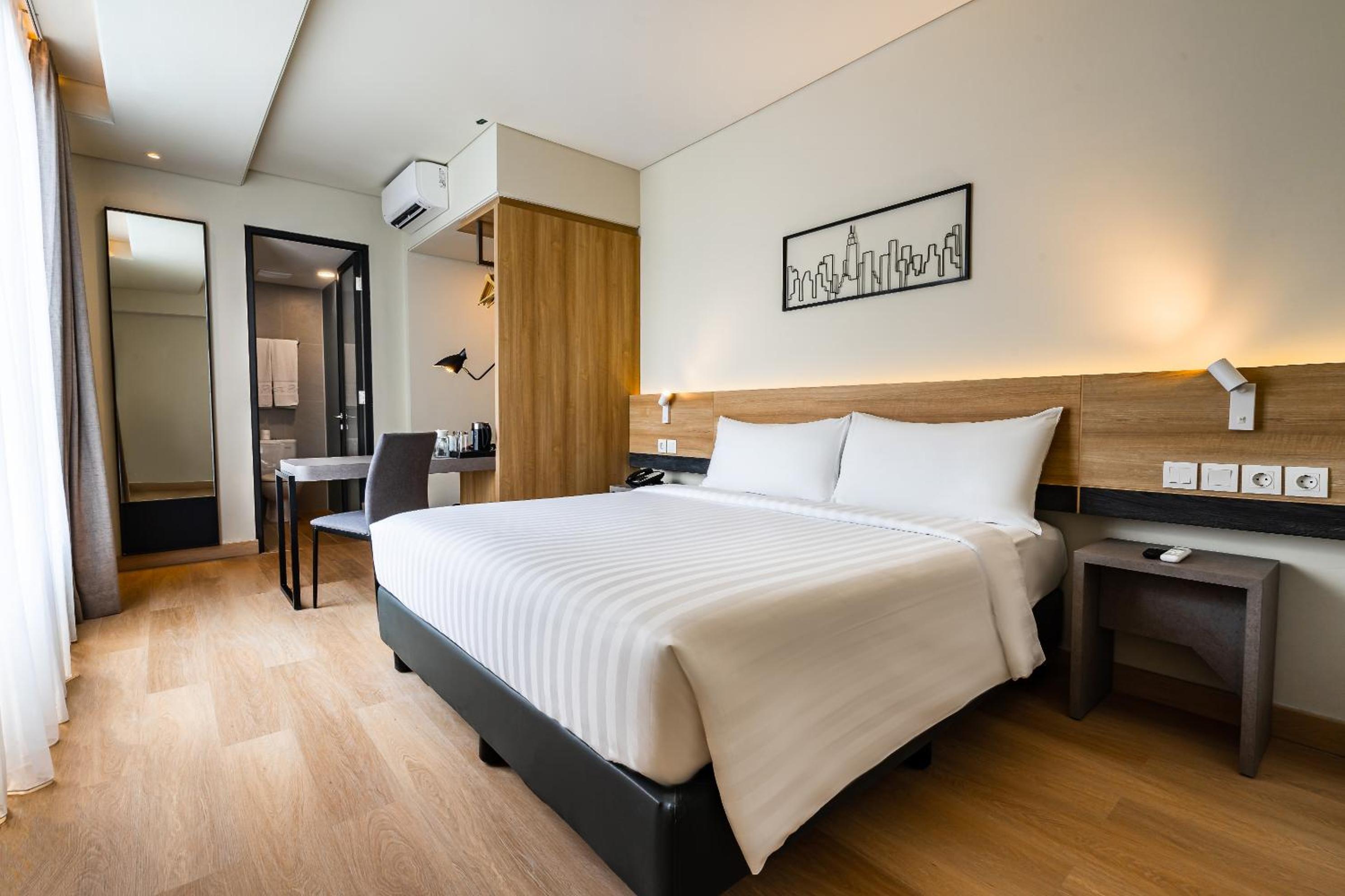 Deluxe Room - Photo 1