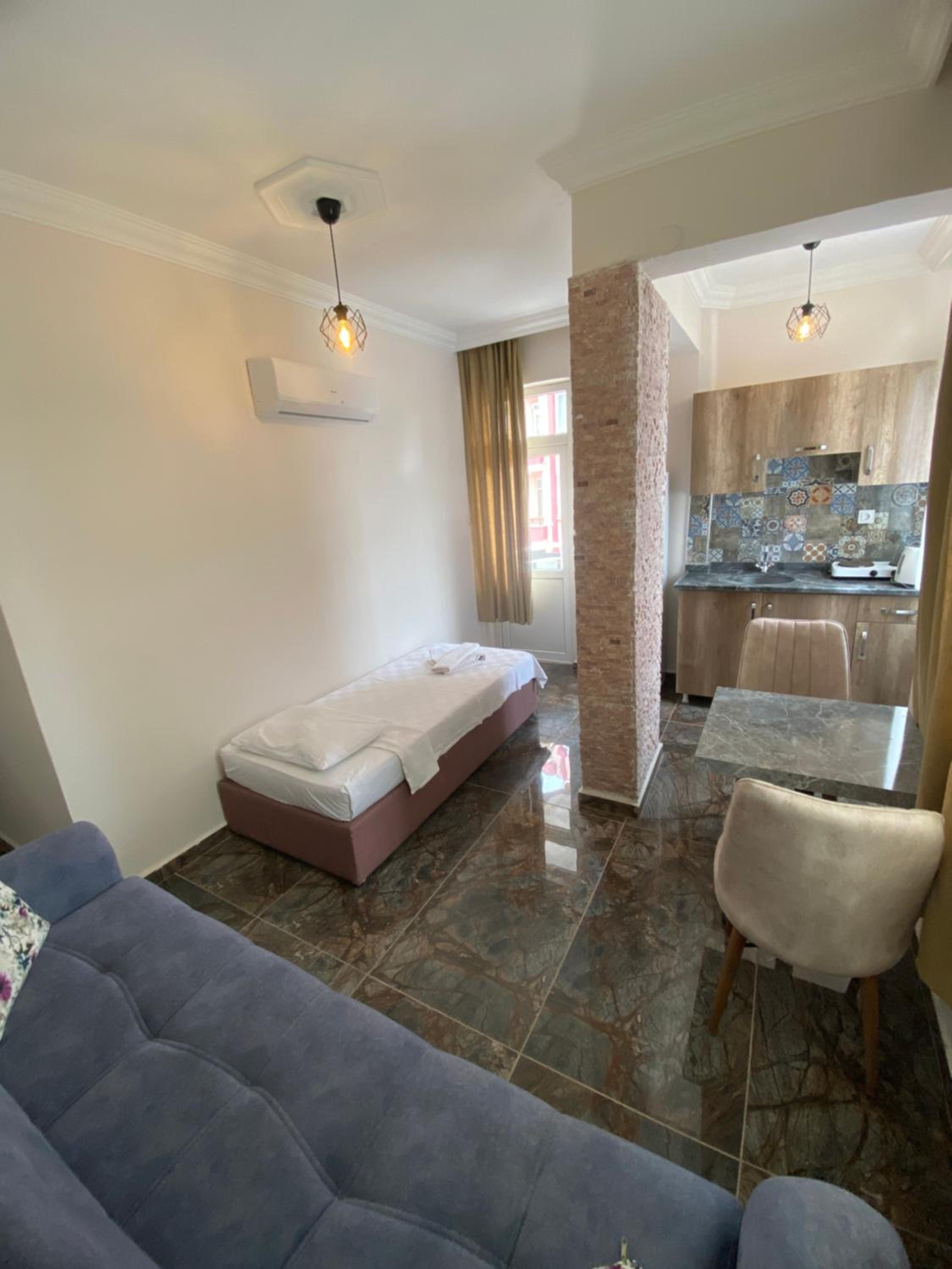 One-Bedroom Apartment (2 Adults) - Photo 2
