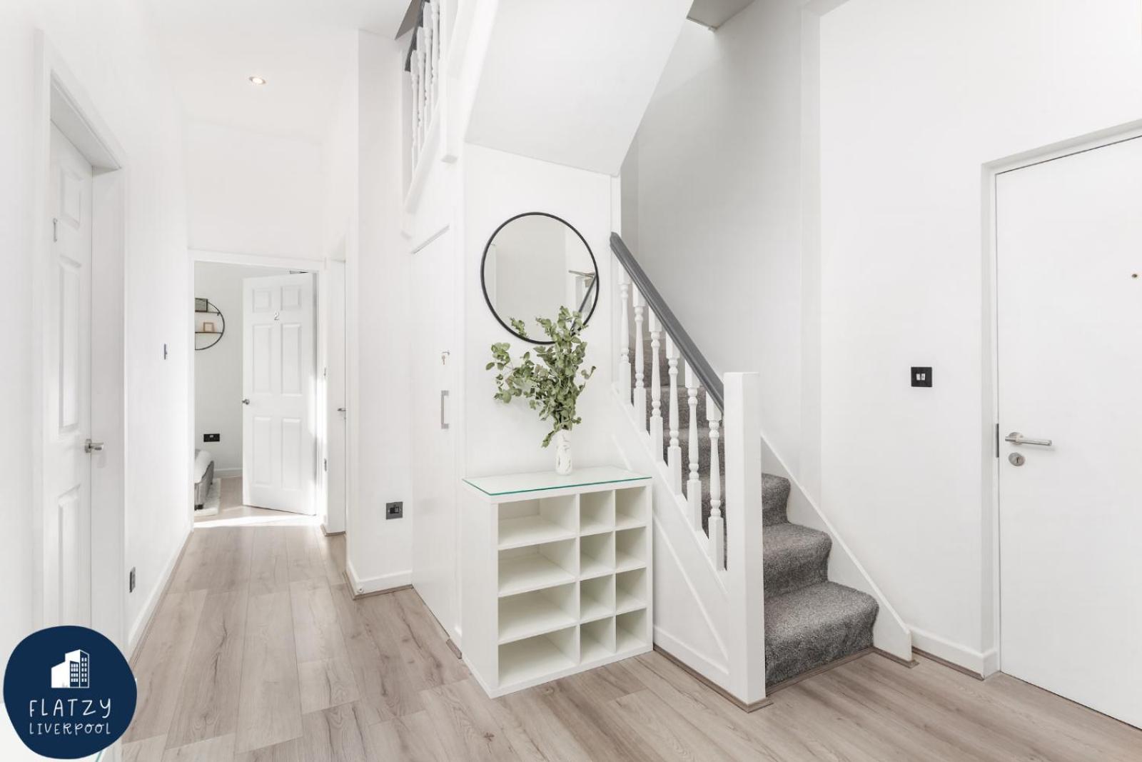 Three-Bedroom Apartment - Photo 32