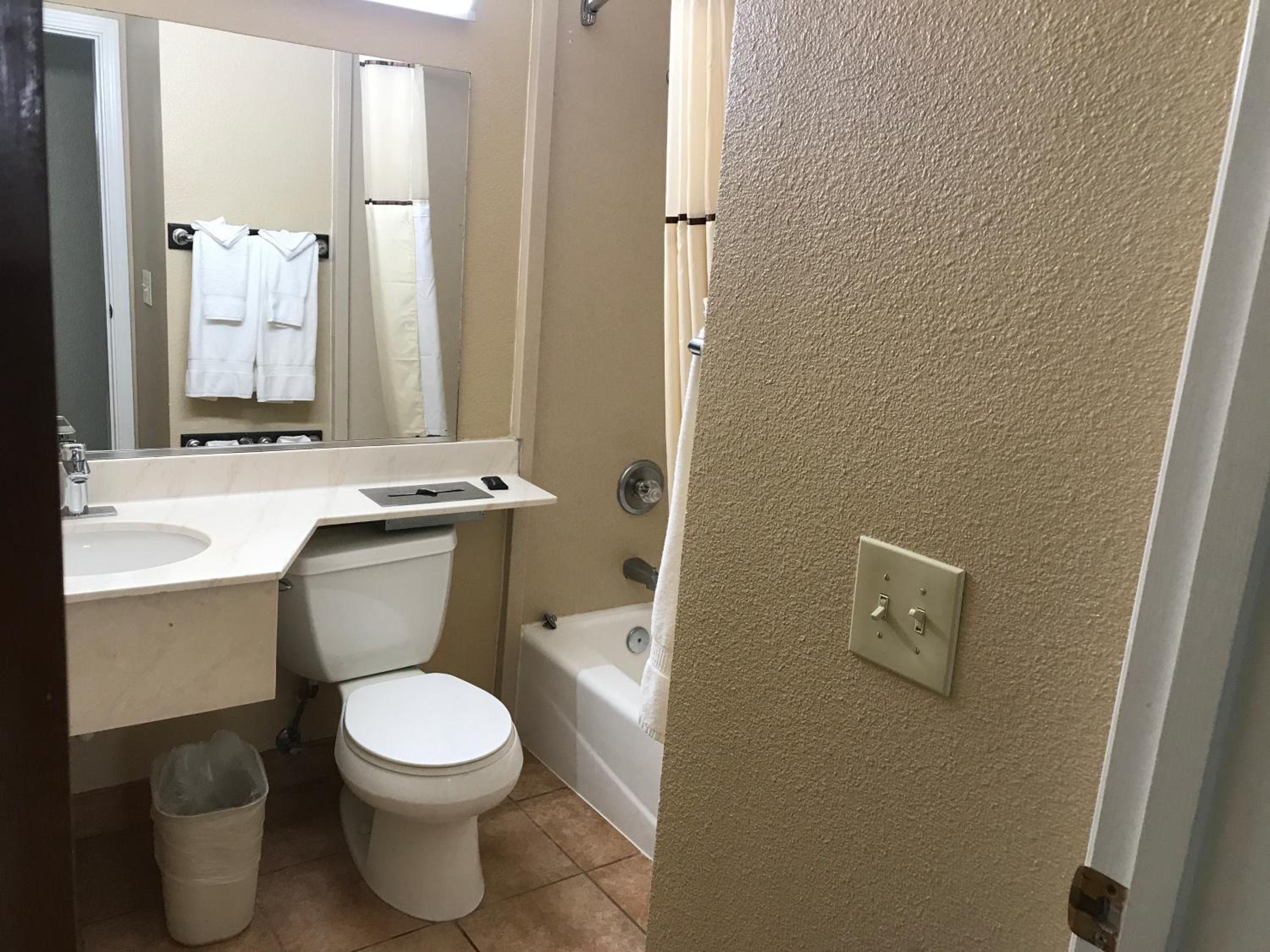 Two Queen Beds Kitchenette Room - Photo 11