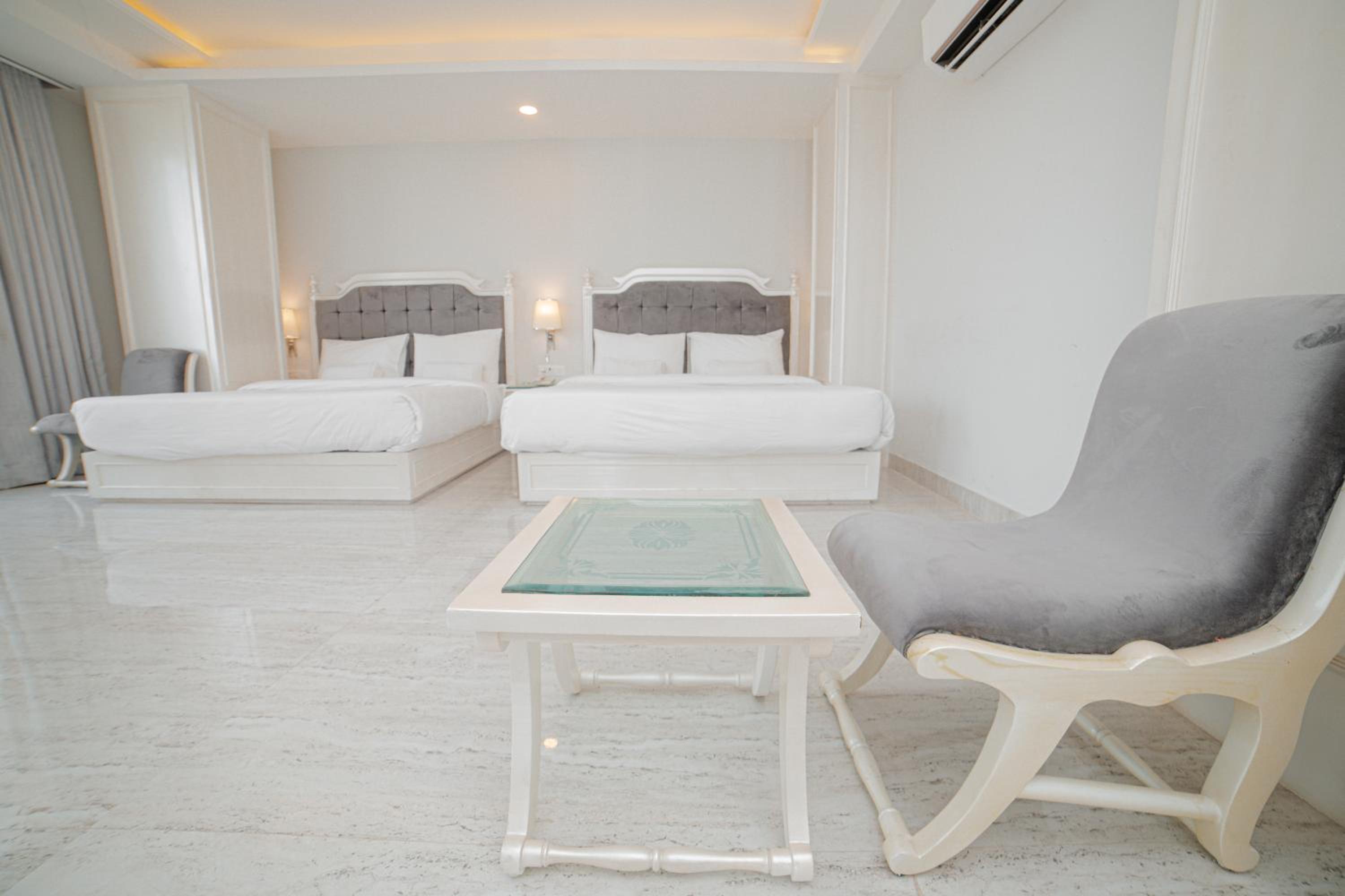 Deluxe Family Suite with 10% off on Two-way Airport/Railway/Bus Transfer and 20% Off on Laundry service for upto 2 clothing items