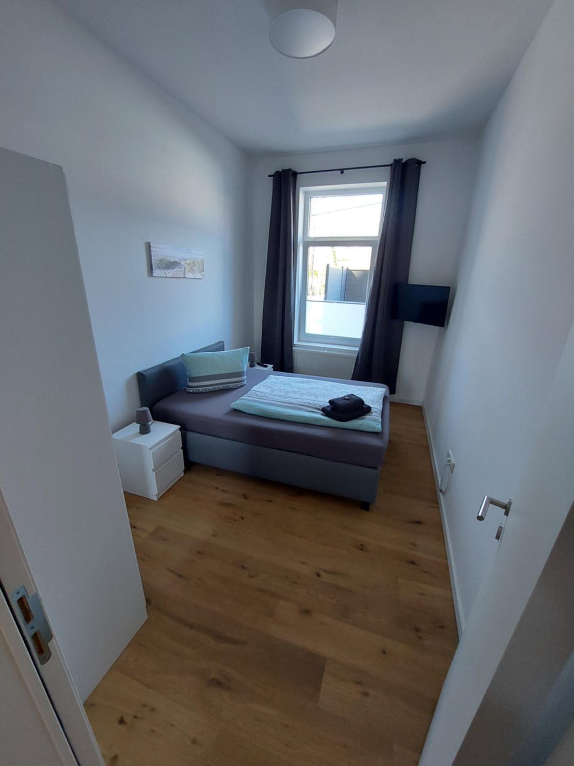 Three-Bedroom Apartment - Photo 3