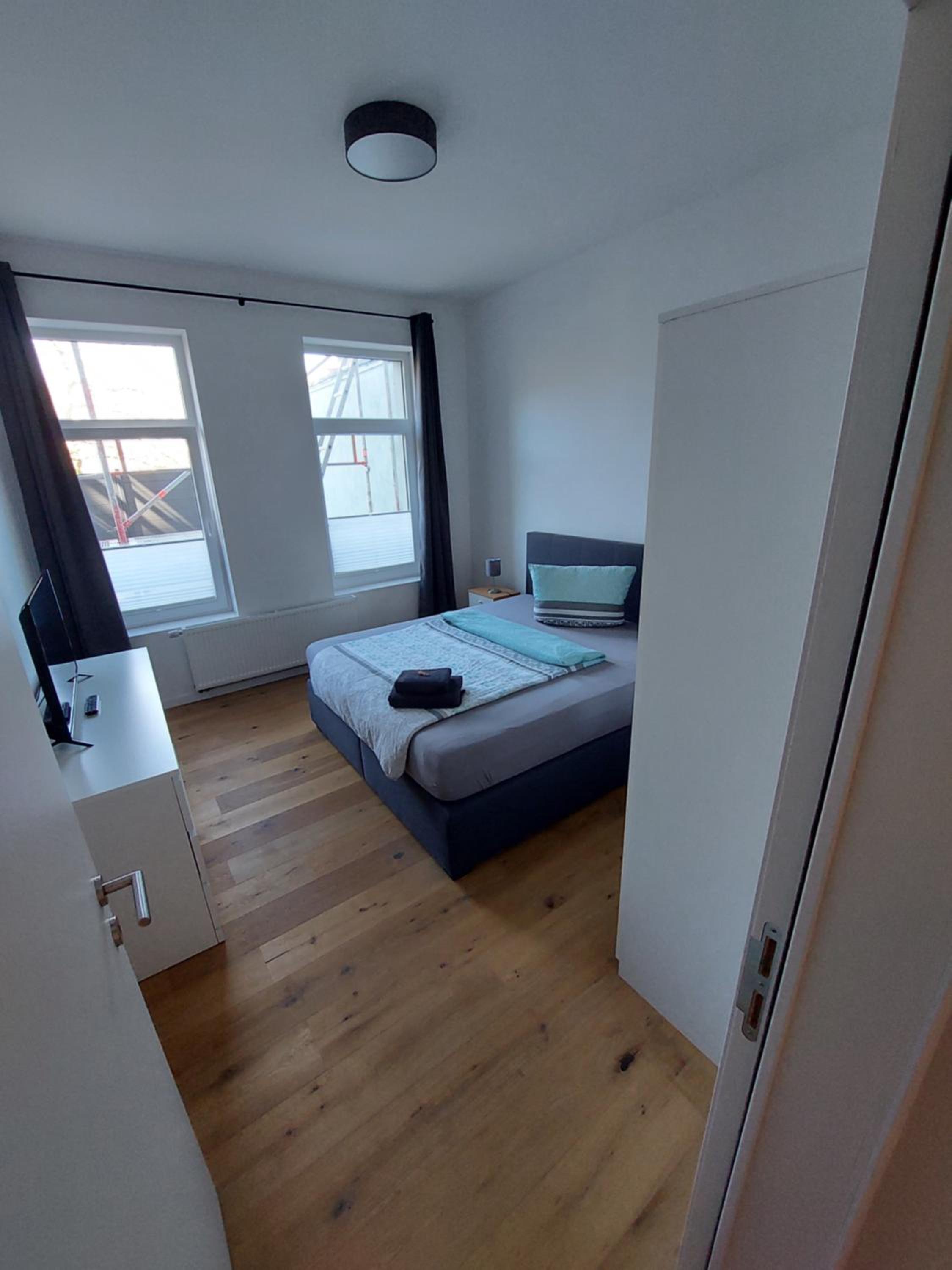 Three-Bedroom Apartment - Photo 30