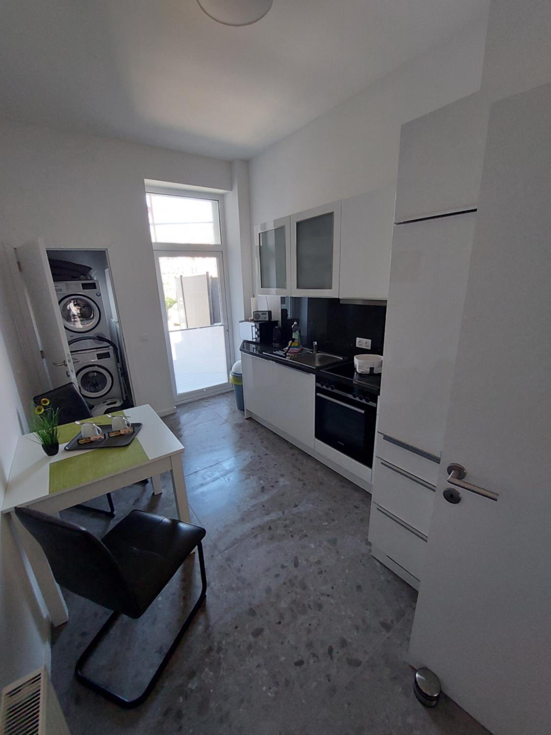Three-Bedroom Apartment - Photo 20