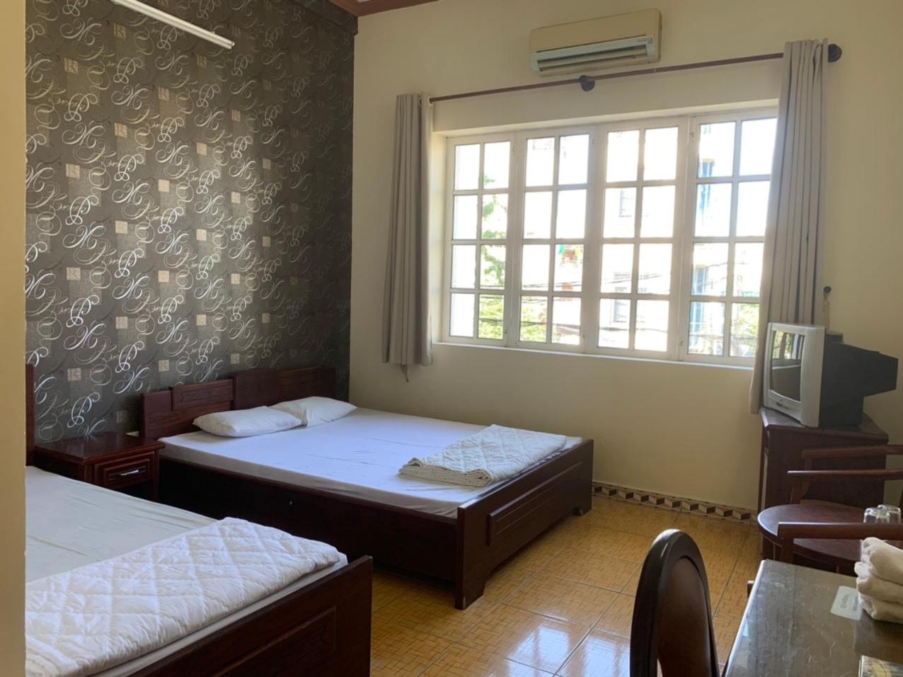 Standard Triple Room - Photo 7