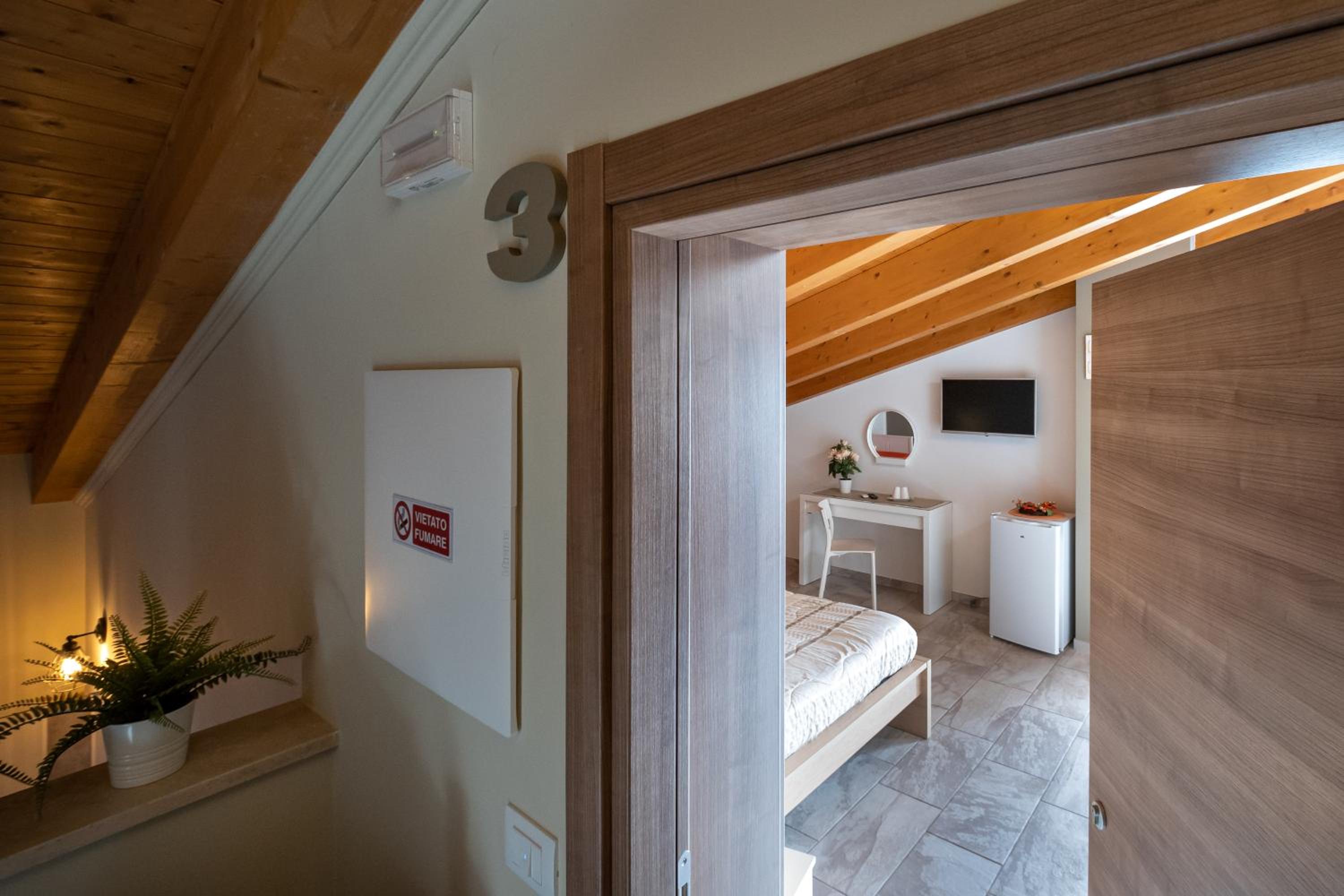 Superior Quadruple Room - Photo 20