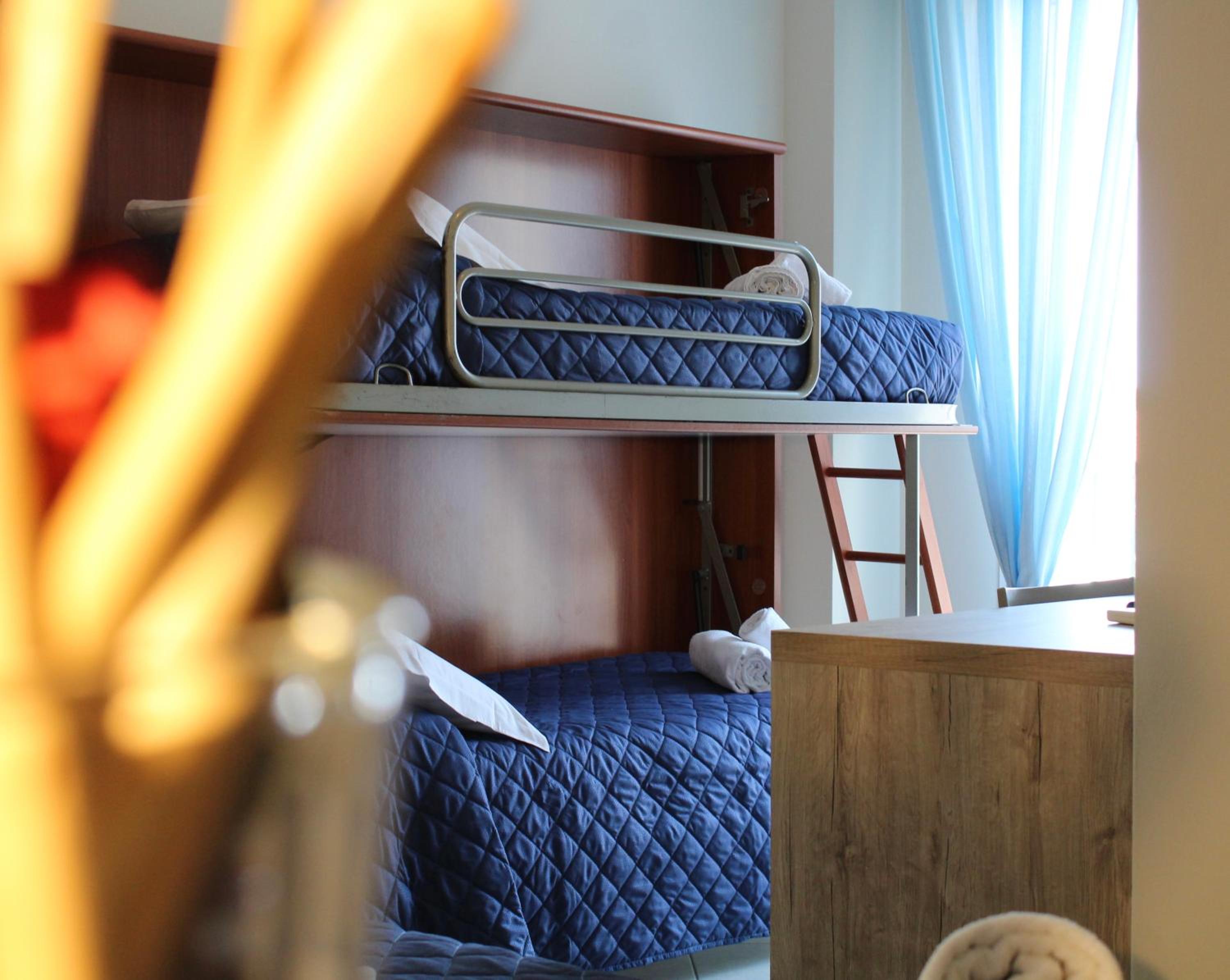 Quadruple Room with Balcony photo 2