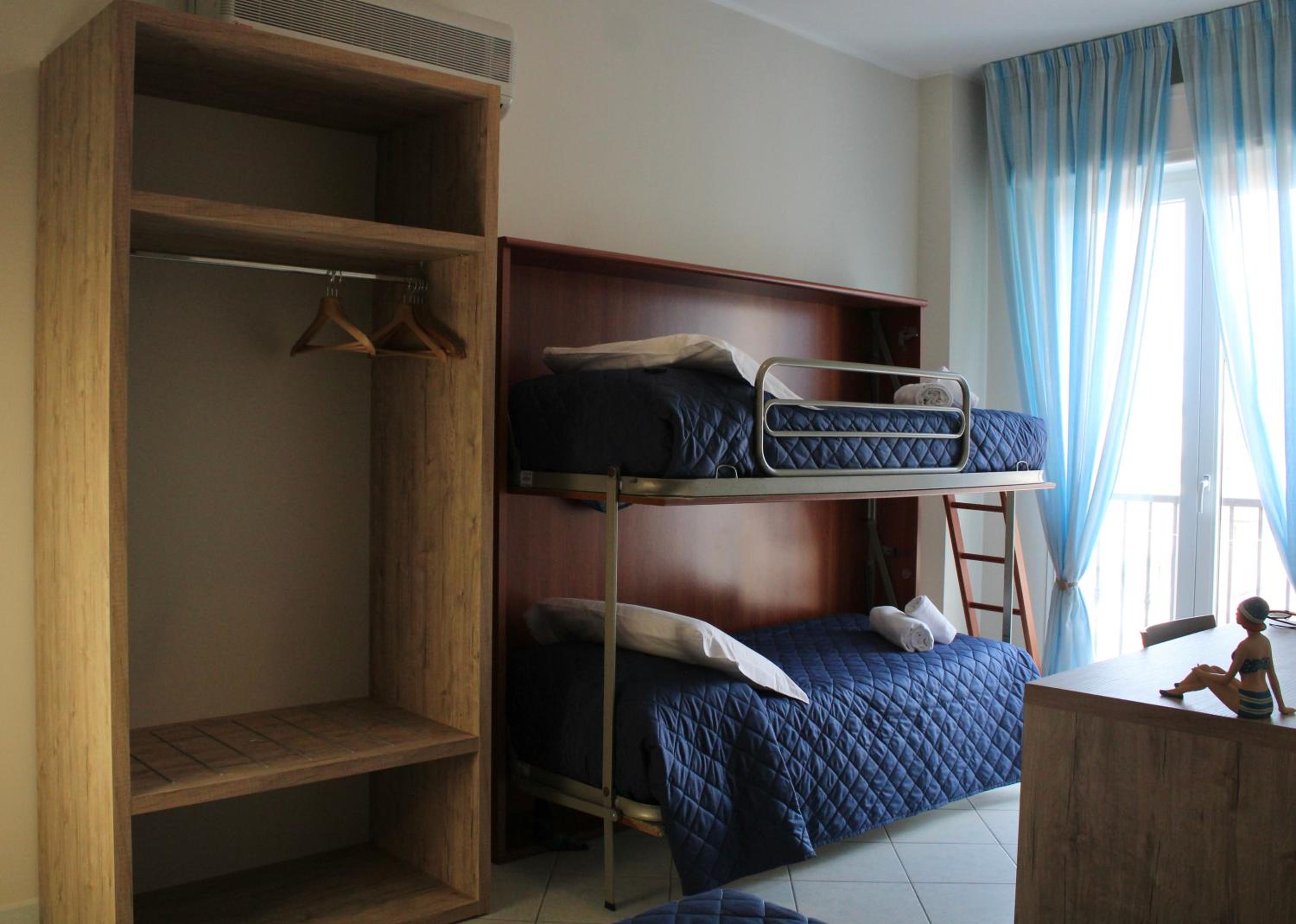 Quadruple Room with Balcony photo 3