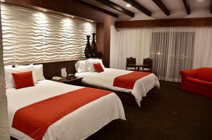 Queen Room with Two Queen Beds and City View - Non-Smoking - Photo 1