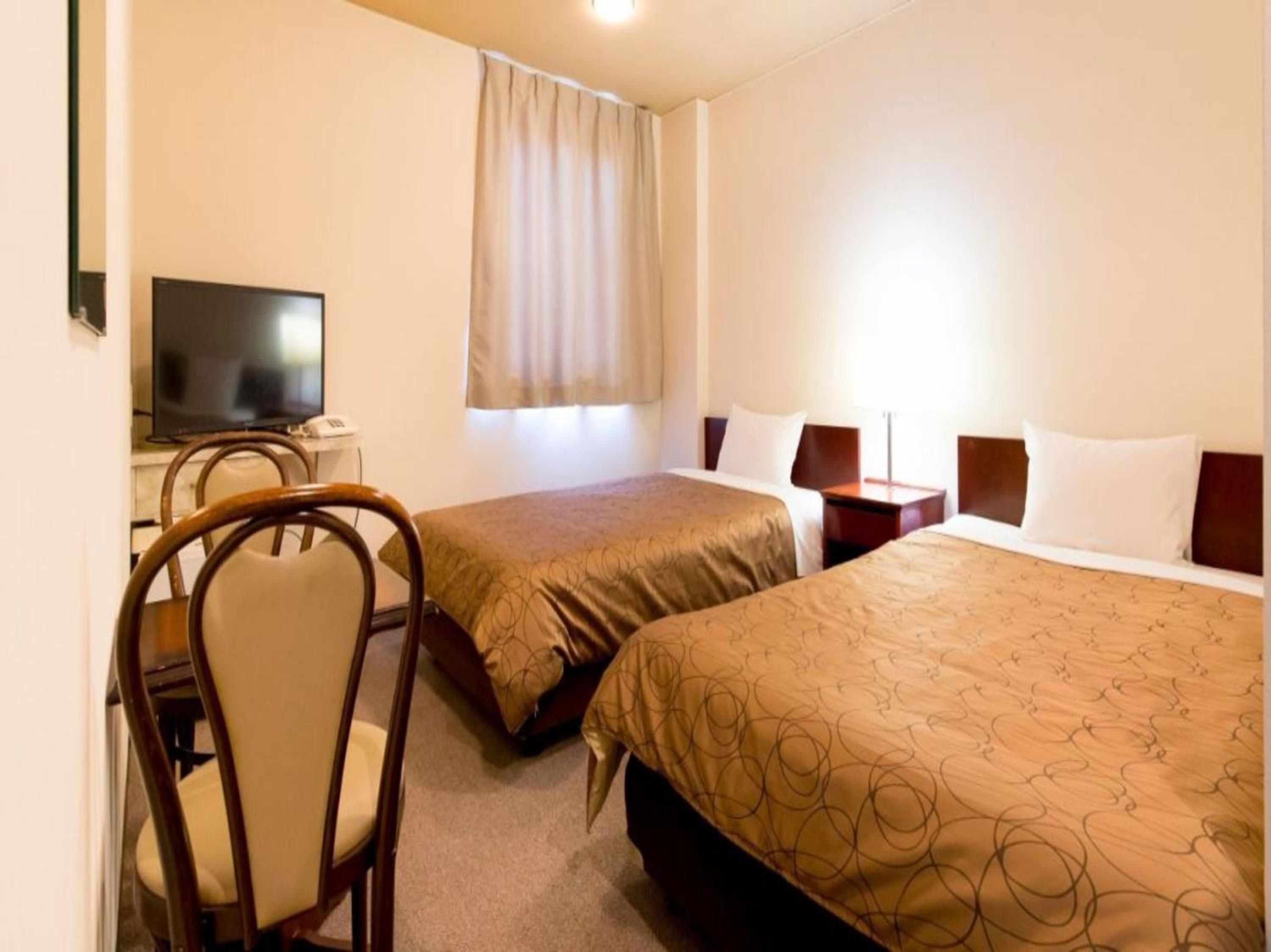 Twin Room - Photo 1