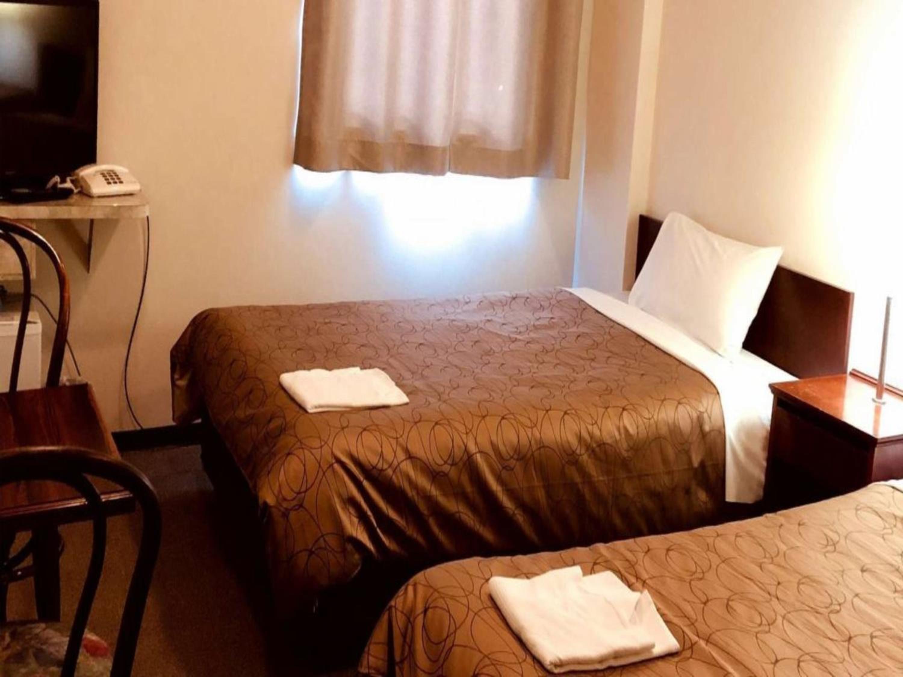 Twin Room - Photo 5