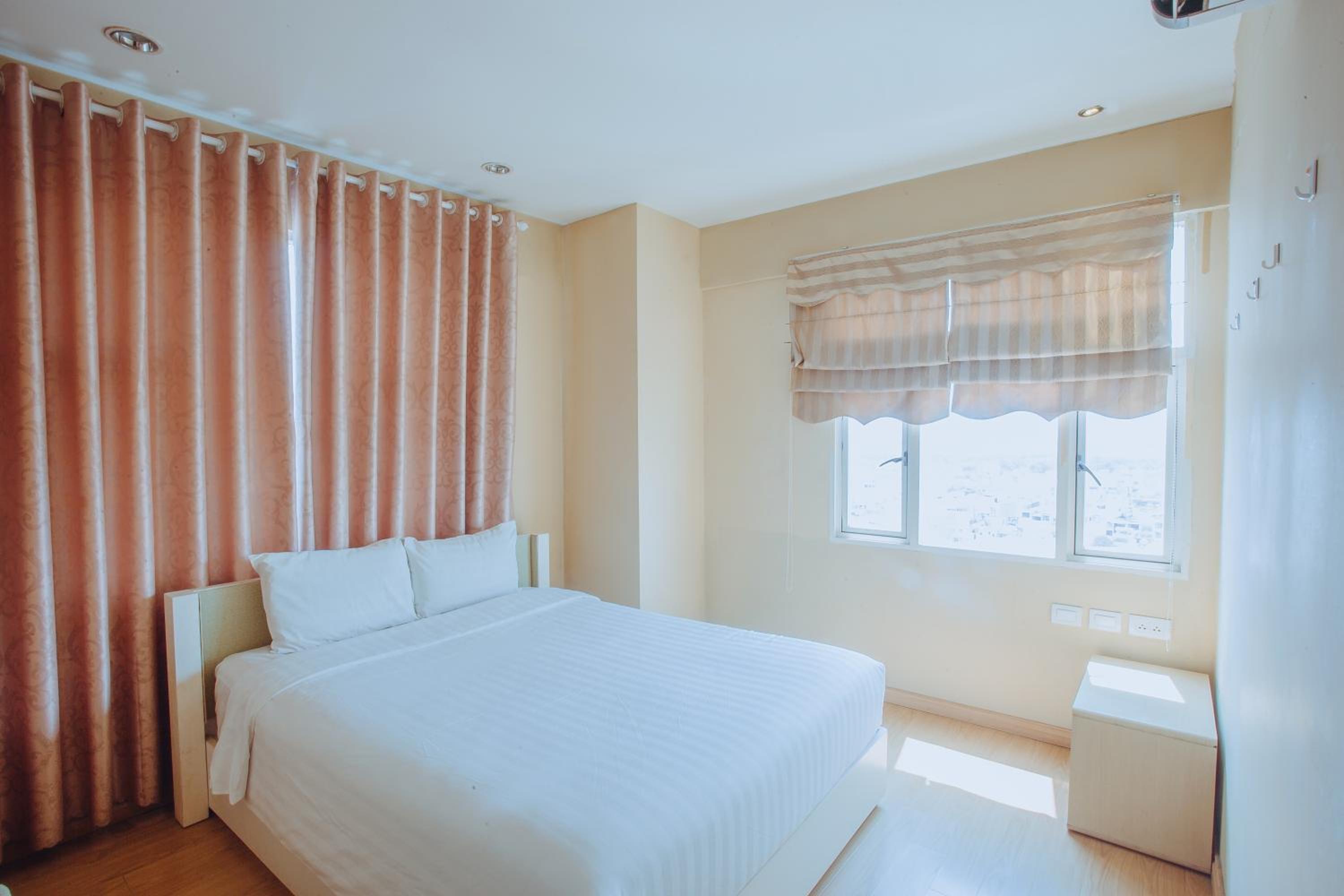 Three-Bedroom Apartment - Photo 2
