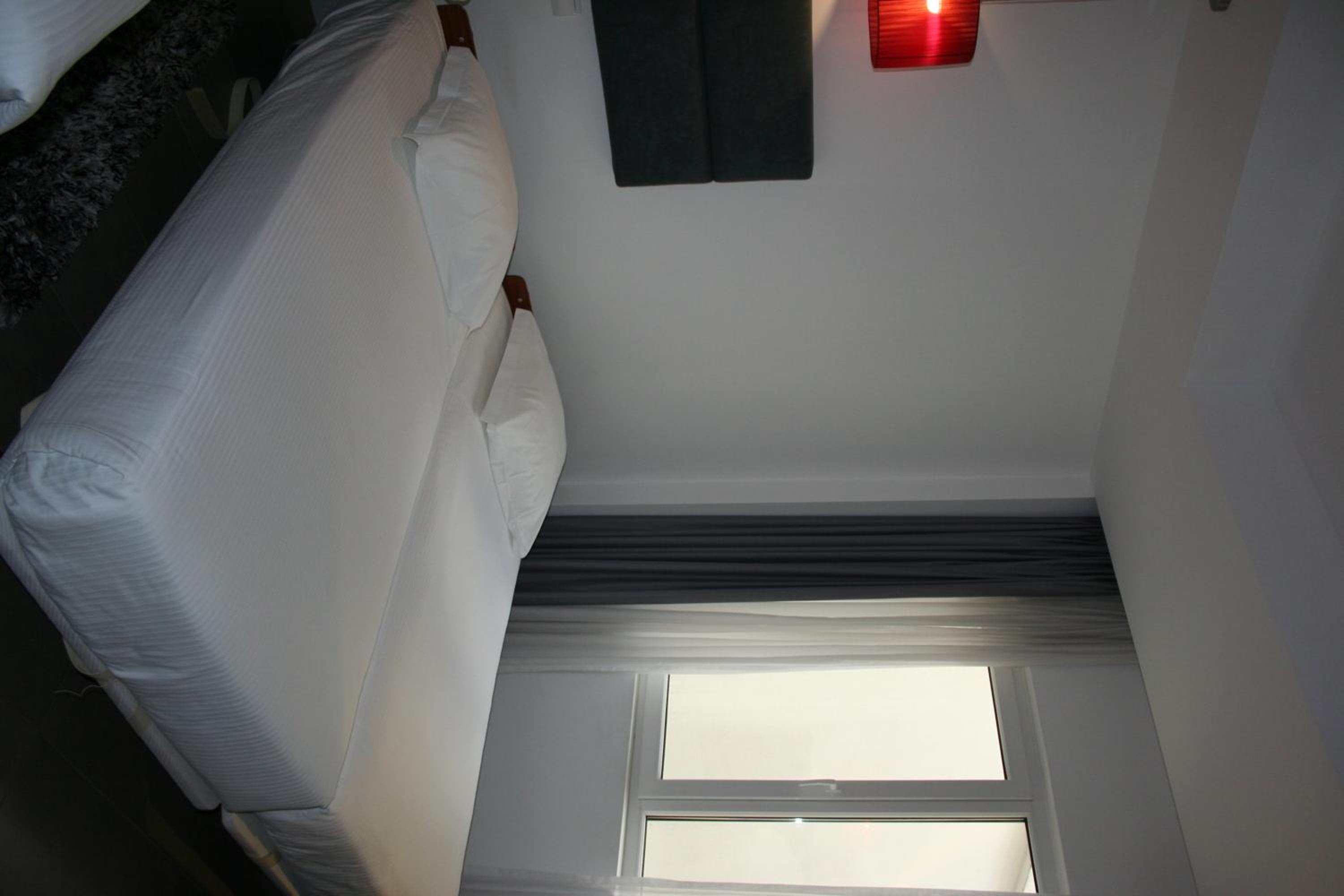 Family Room -1 Double bed and 2 Single Beds
