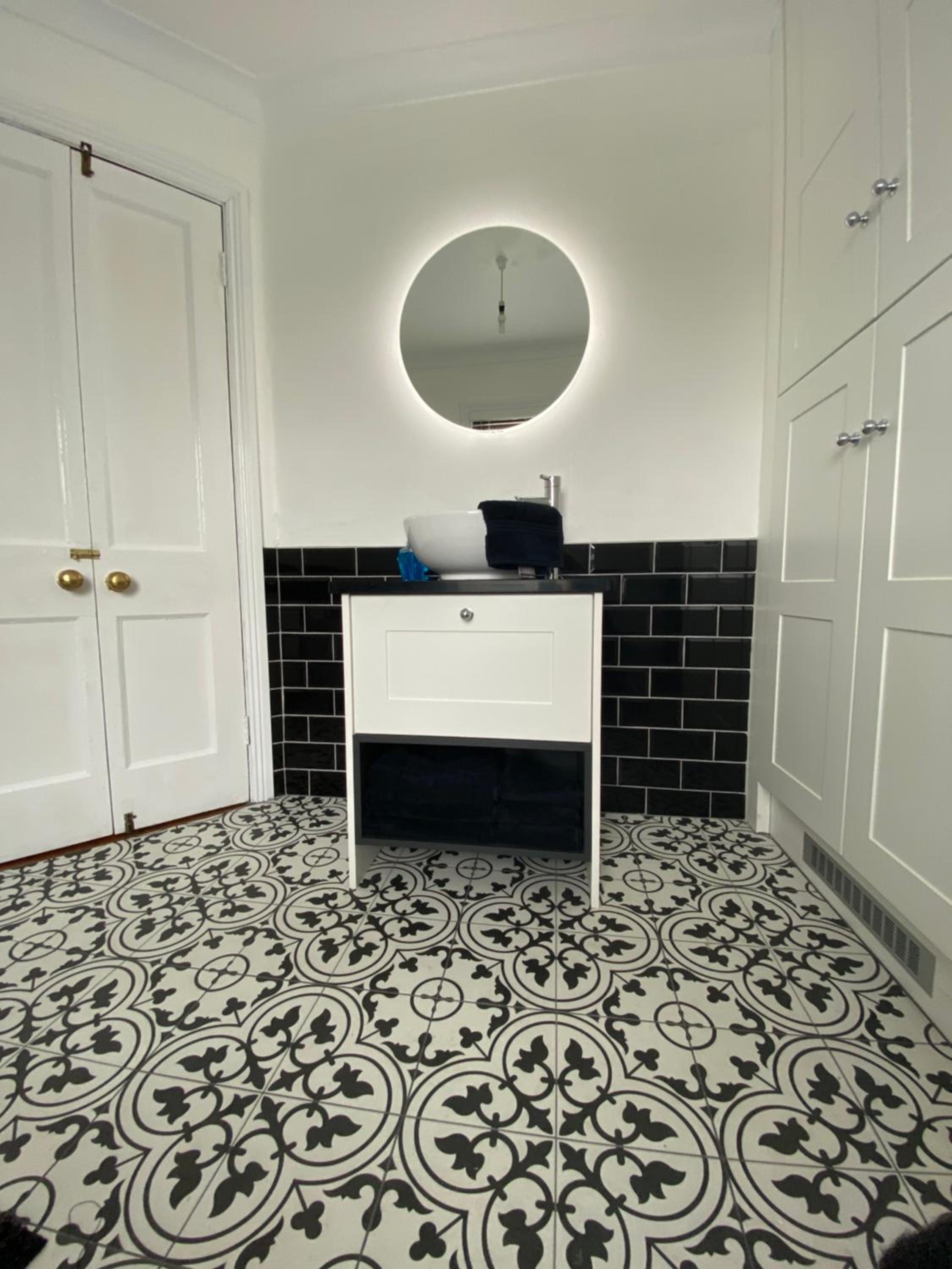 Three-Bedroom House - Photo 18