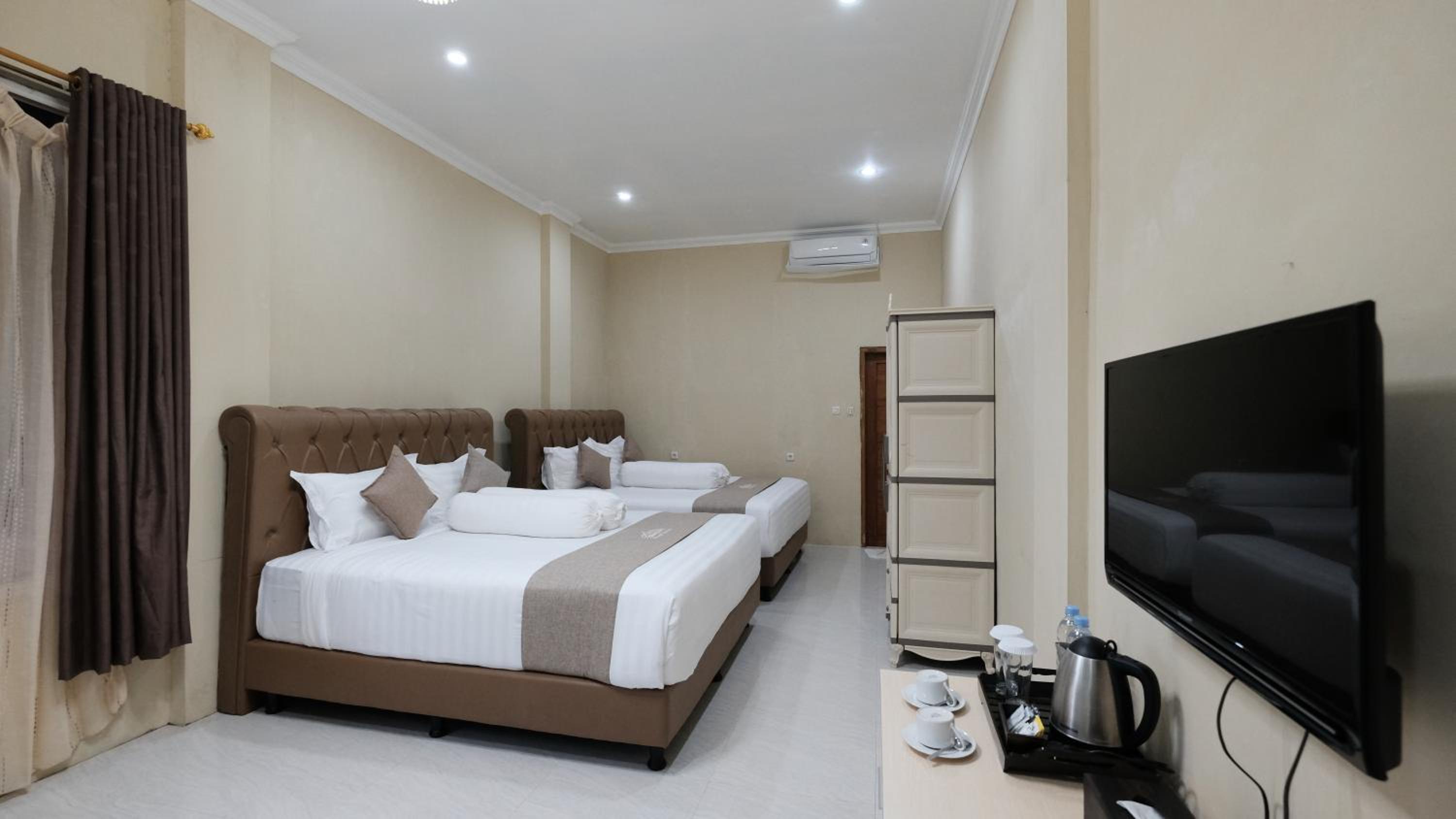 Standard Twin Room - Photo 1