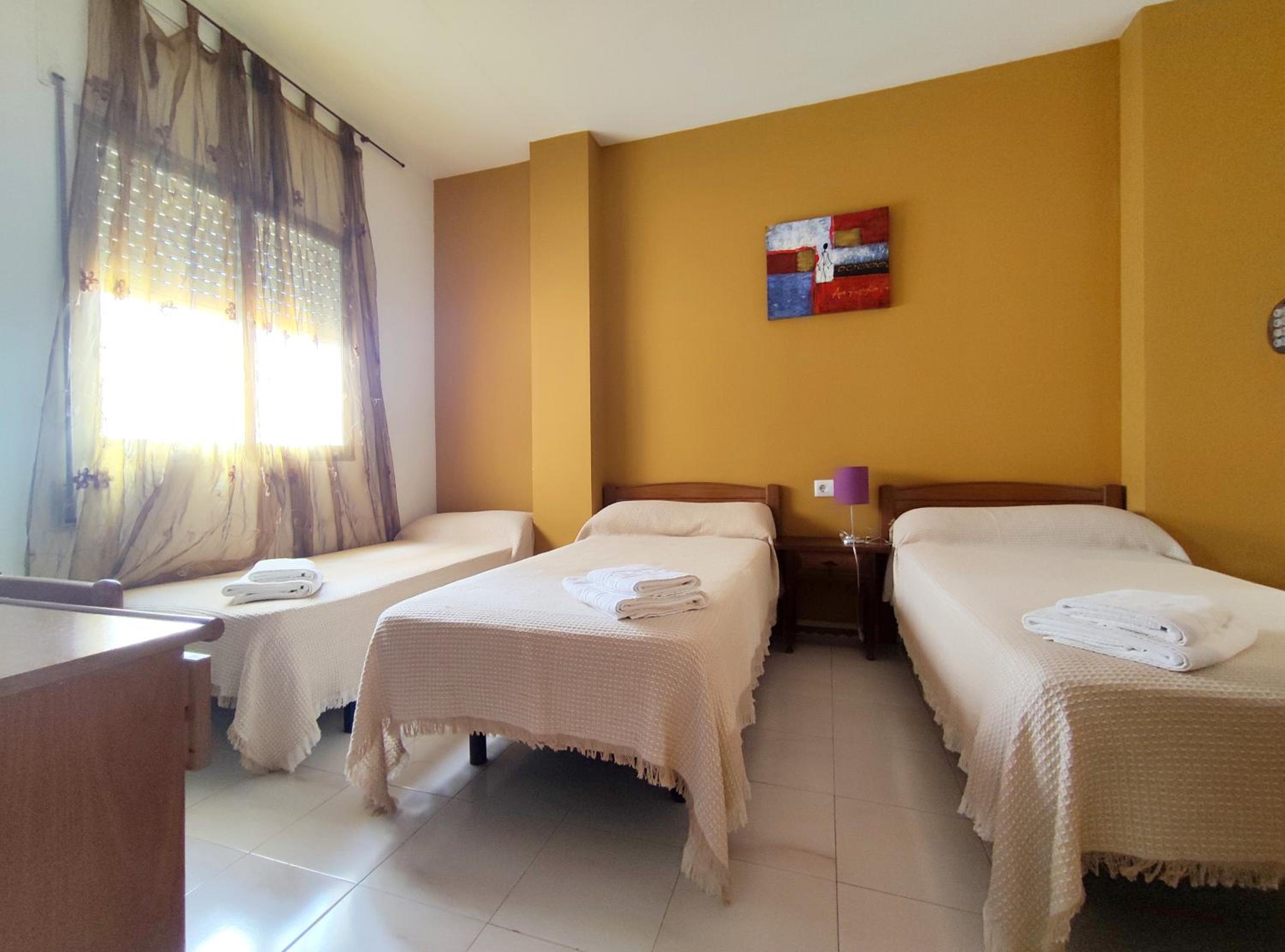 Habitación triple con baño